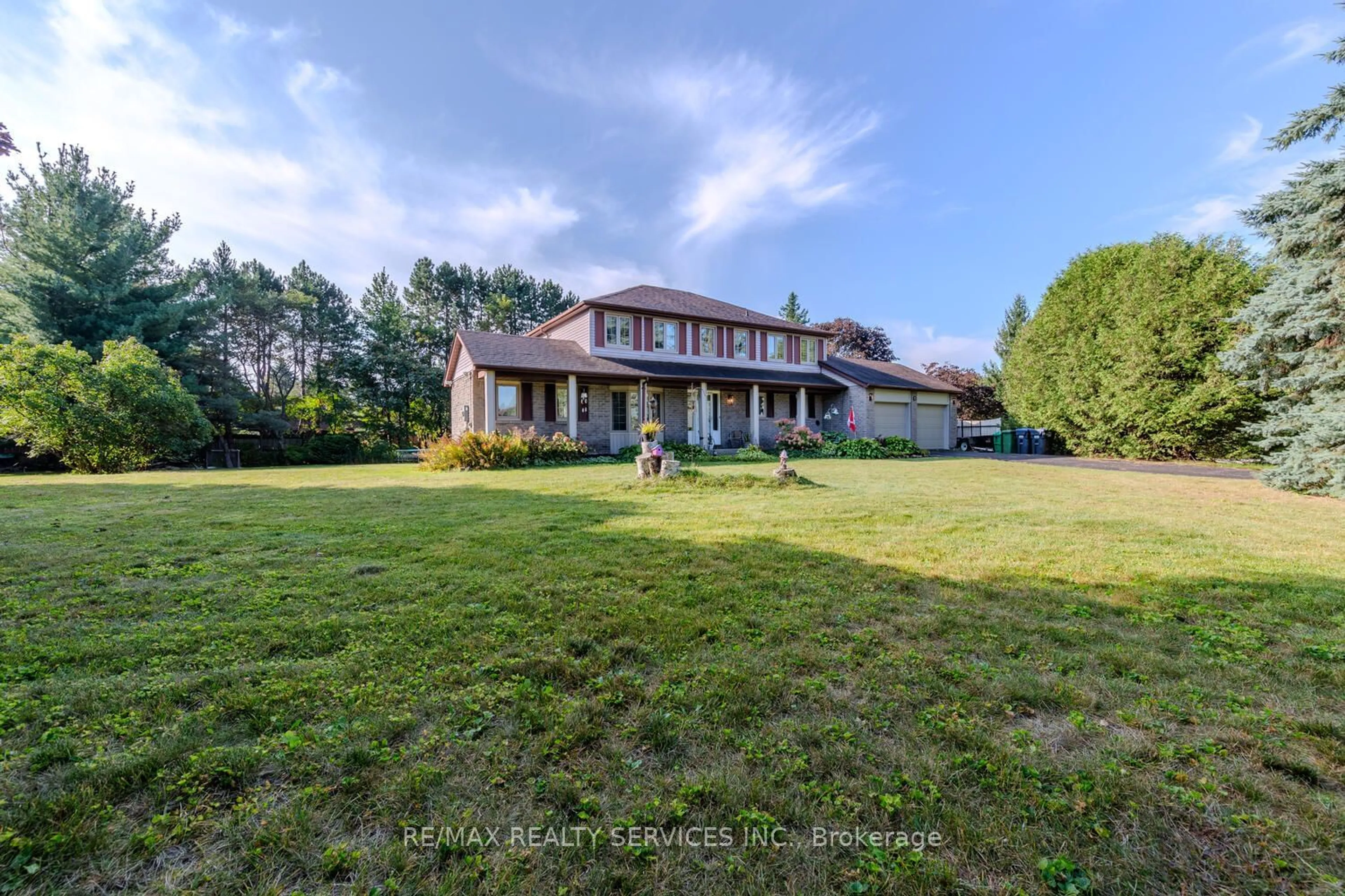 Frontside or backside of a home, the street view for 1 McCort Dr, Caledon Ontario L7K 0Z4