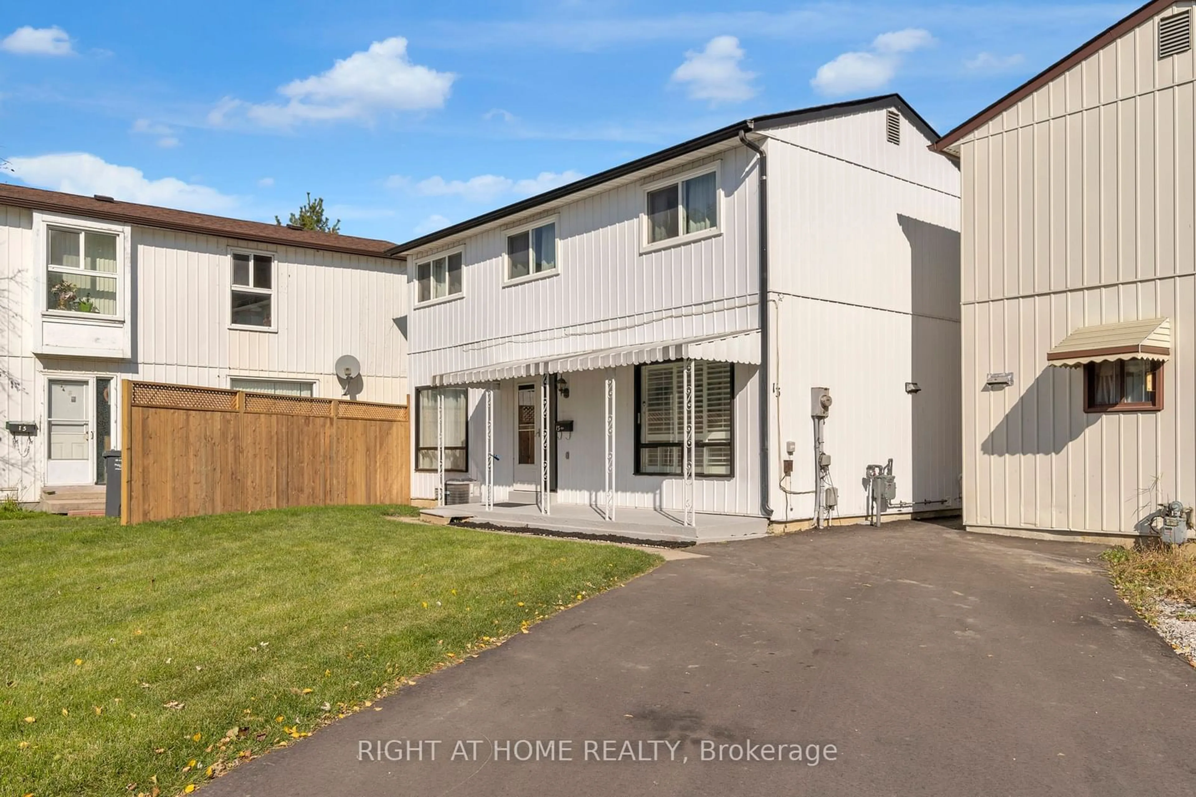 Frontside or backside of a home, the fenced backyard for 13 Huntingwood Cres, Brampton Ontario L6S 1S5