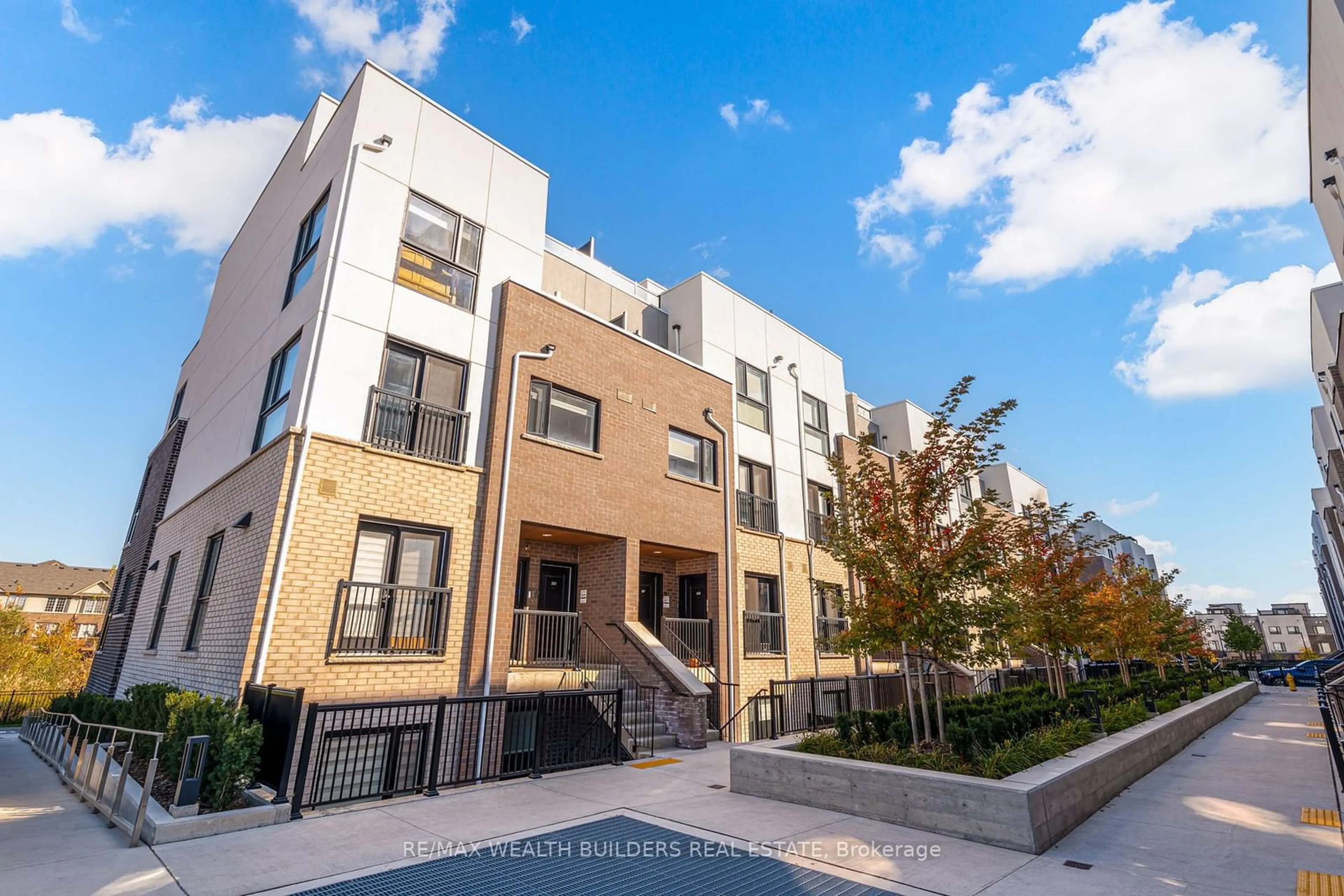 A pic from exterior of the house or condo, the front or back of building for 349 Wheat Boom Dr #205, Oakville Ontario L6H 7X5