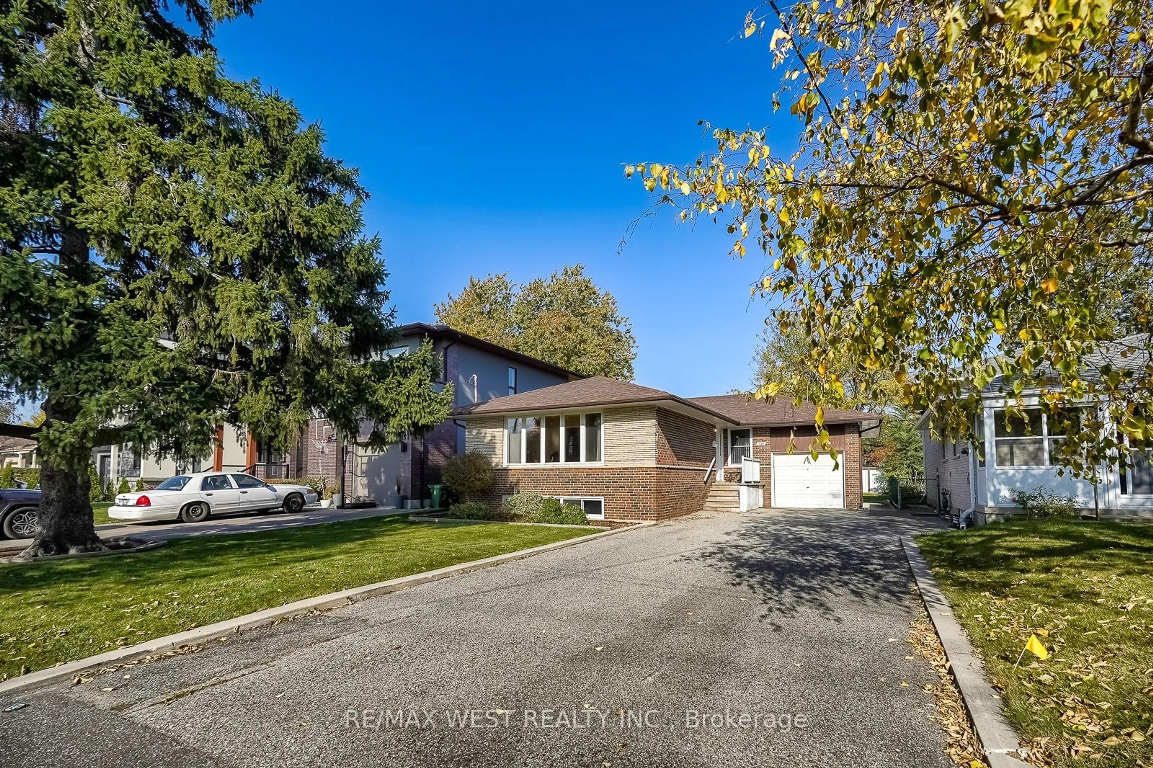 A pic from exterior of the house or condo, the street view for 330 Rathburn Rd, Toronto Ontario M9B 2M1