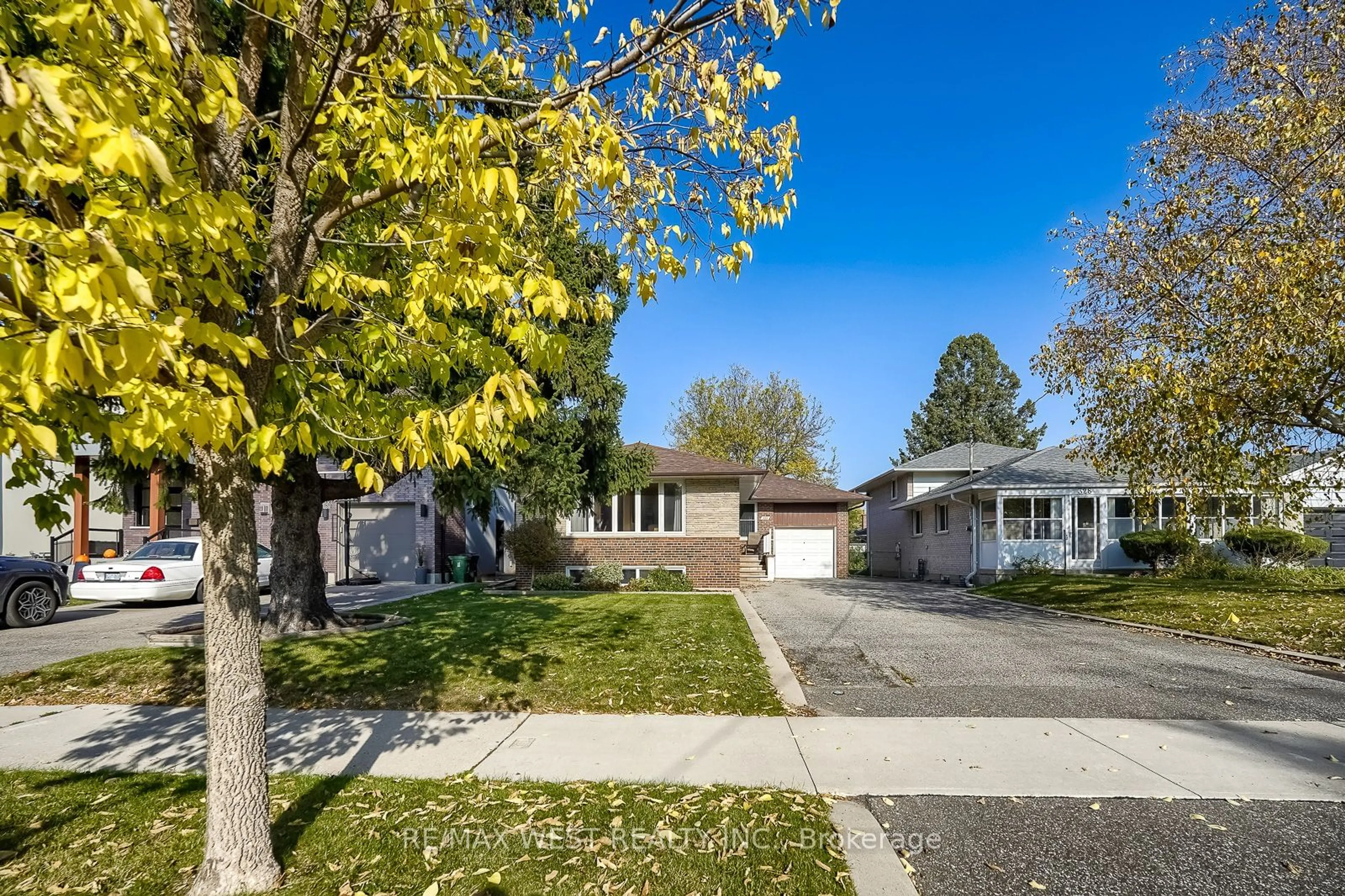 A pic from exterior of the house or condo, the street view for 330 Rathburn Rd, Toronto Ontario M9B 2M1