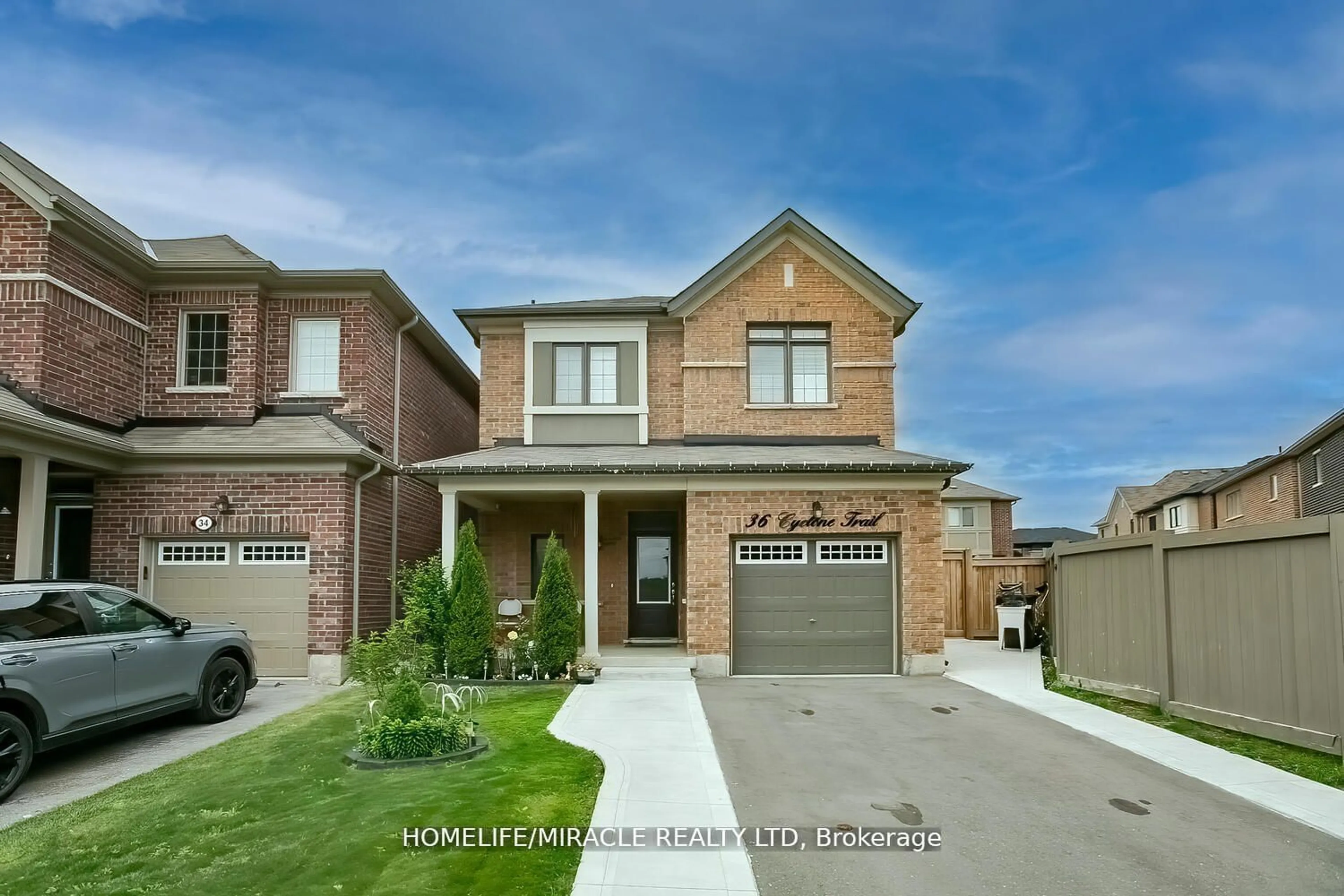 Home with brick exterior material for 36 Cyclone Tr, Brampton Ontario L7A 5E7