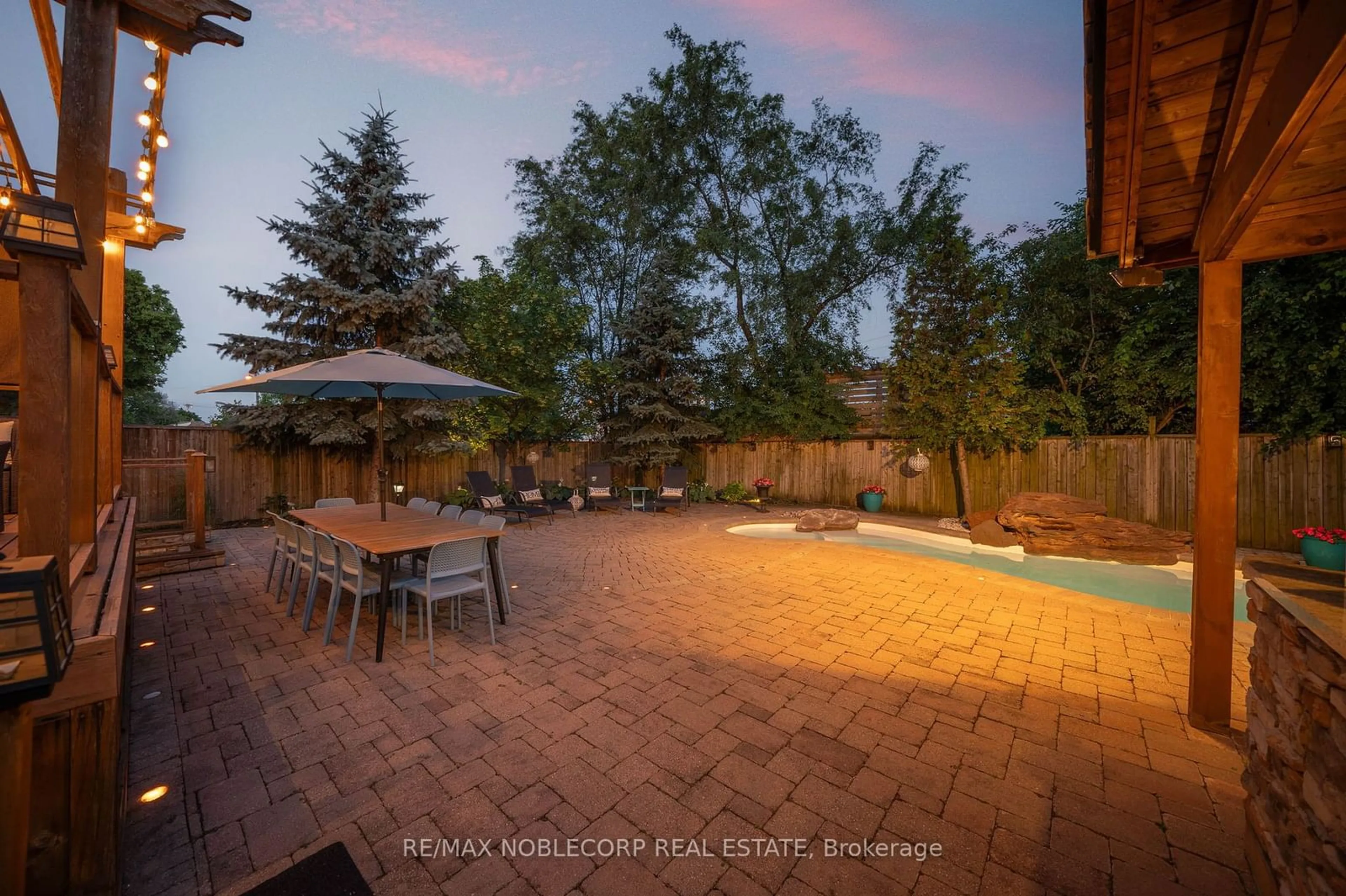 Patio, the fenced backyard for 35 Yorkdale Cres, Toronto Ontario M9M 1C2