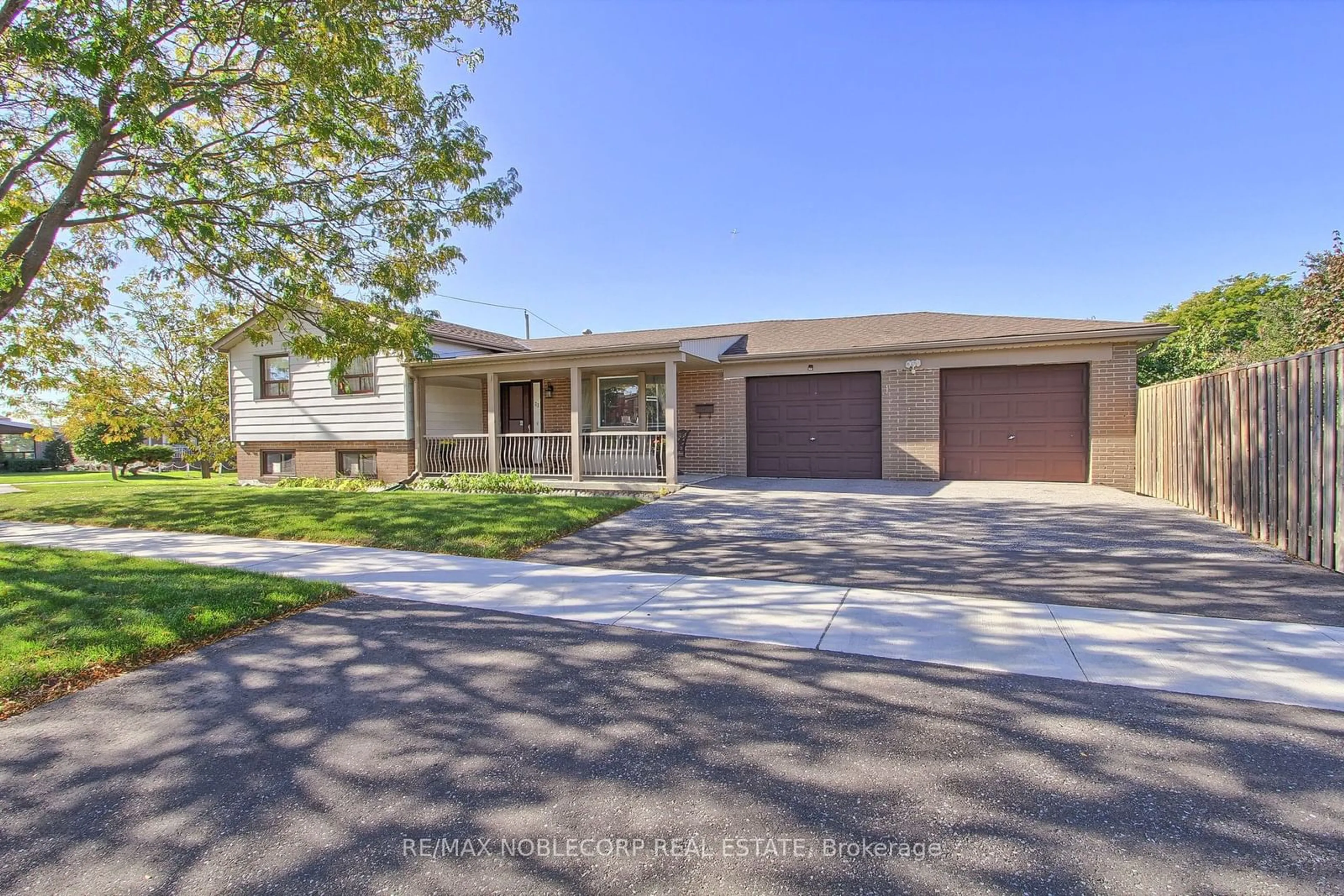 Frontside or backside of a home, the street view for 22 Bimini Cres, Toronto Ontario M3N 1R9