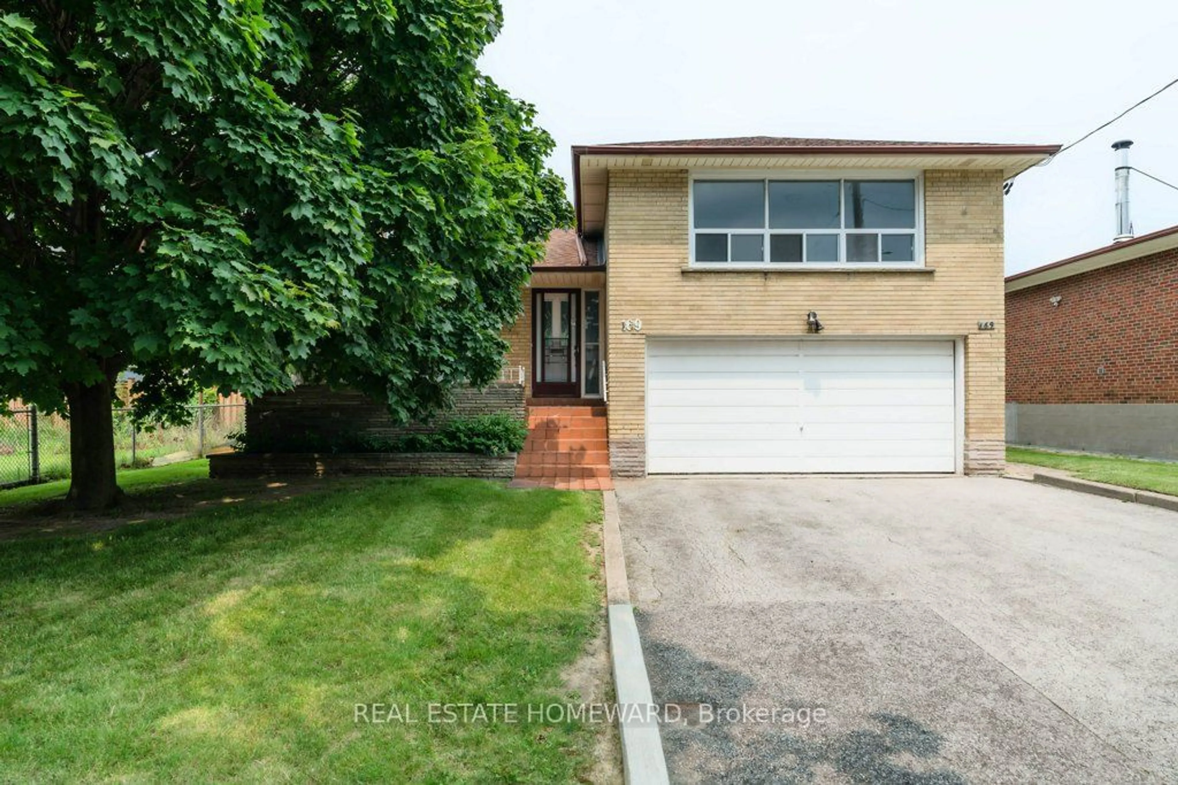 Frontside or backside of a home, the street view for 169 Exbury Rd, Toronto Ontario M3M 1R9