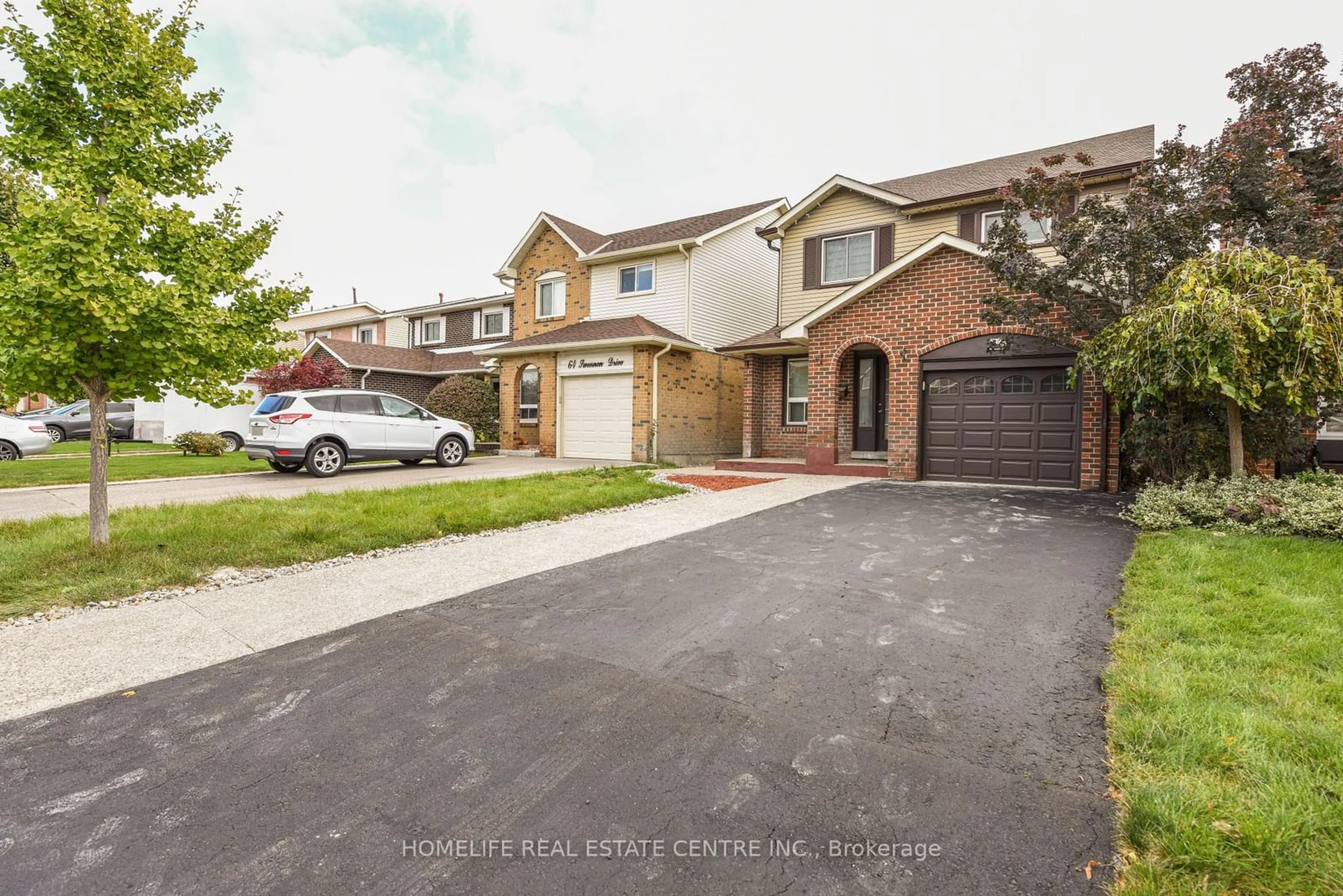 A pic from exterior of the house or condo, the street view for 66 Swennen Dr, Brampton Ontario L6V 4E1