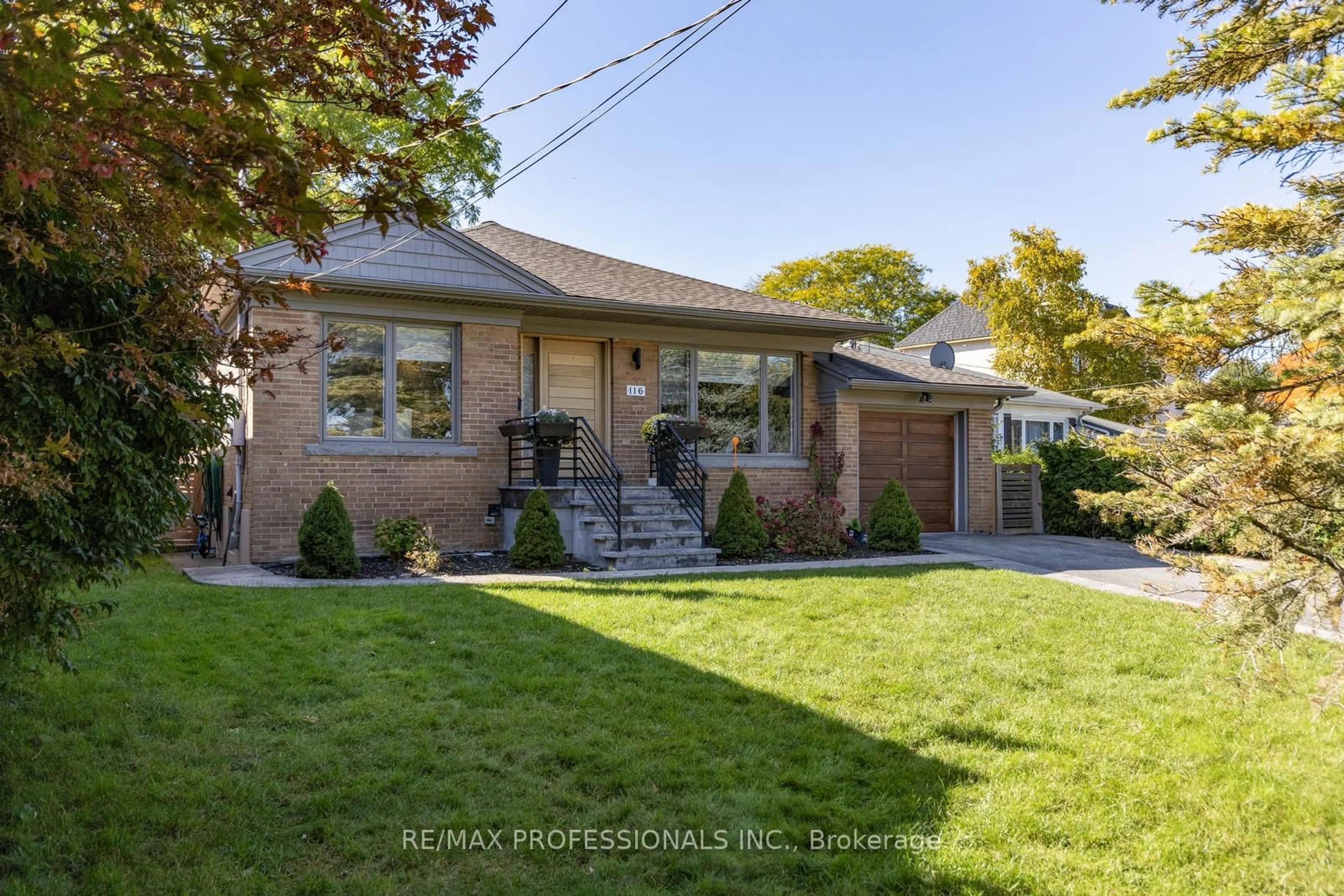 Frontside or backside of a home, the fenced backyard for 116 Ravenscrest Dr, Toronto Ontario M9B 5N3