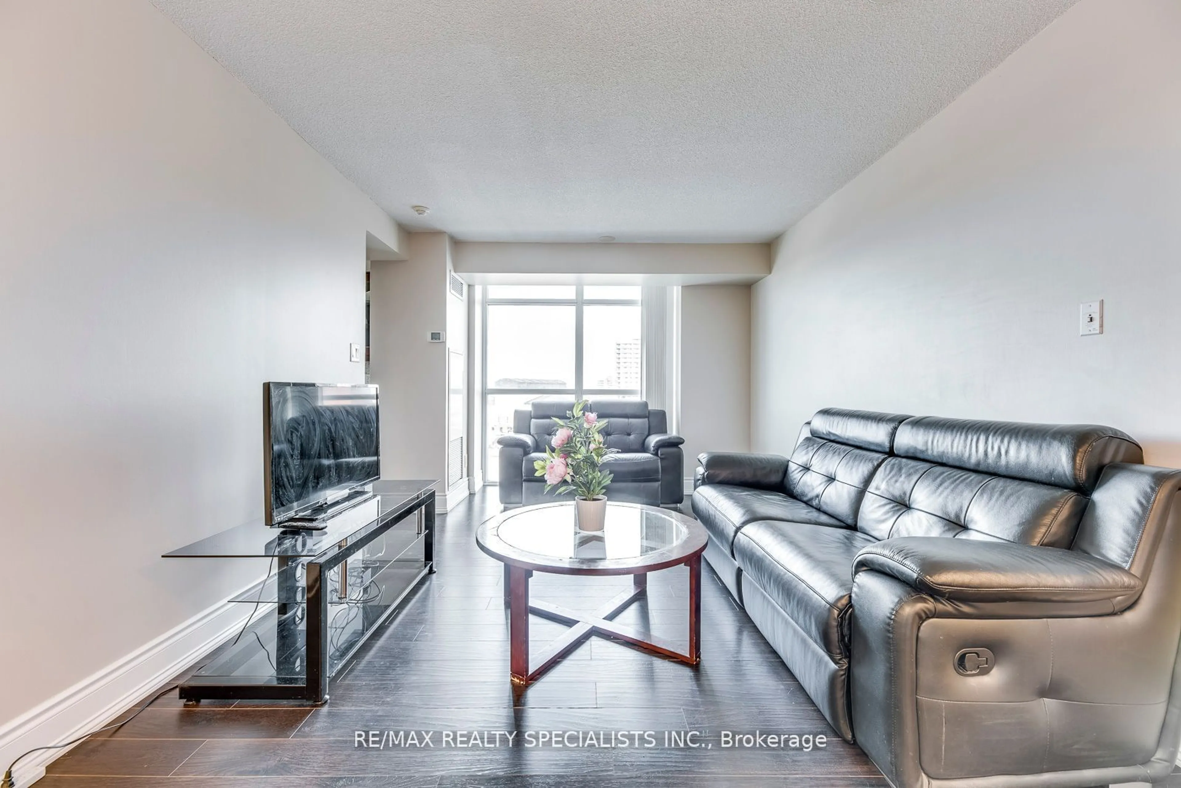 Living room, wood floors for 9 George St #702, Brampton Ontario L6X 0T6