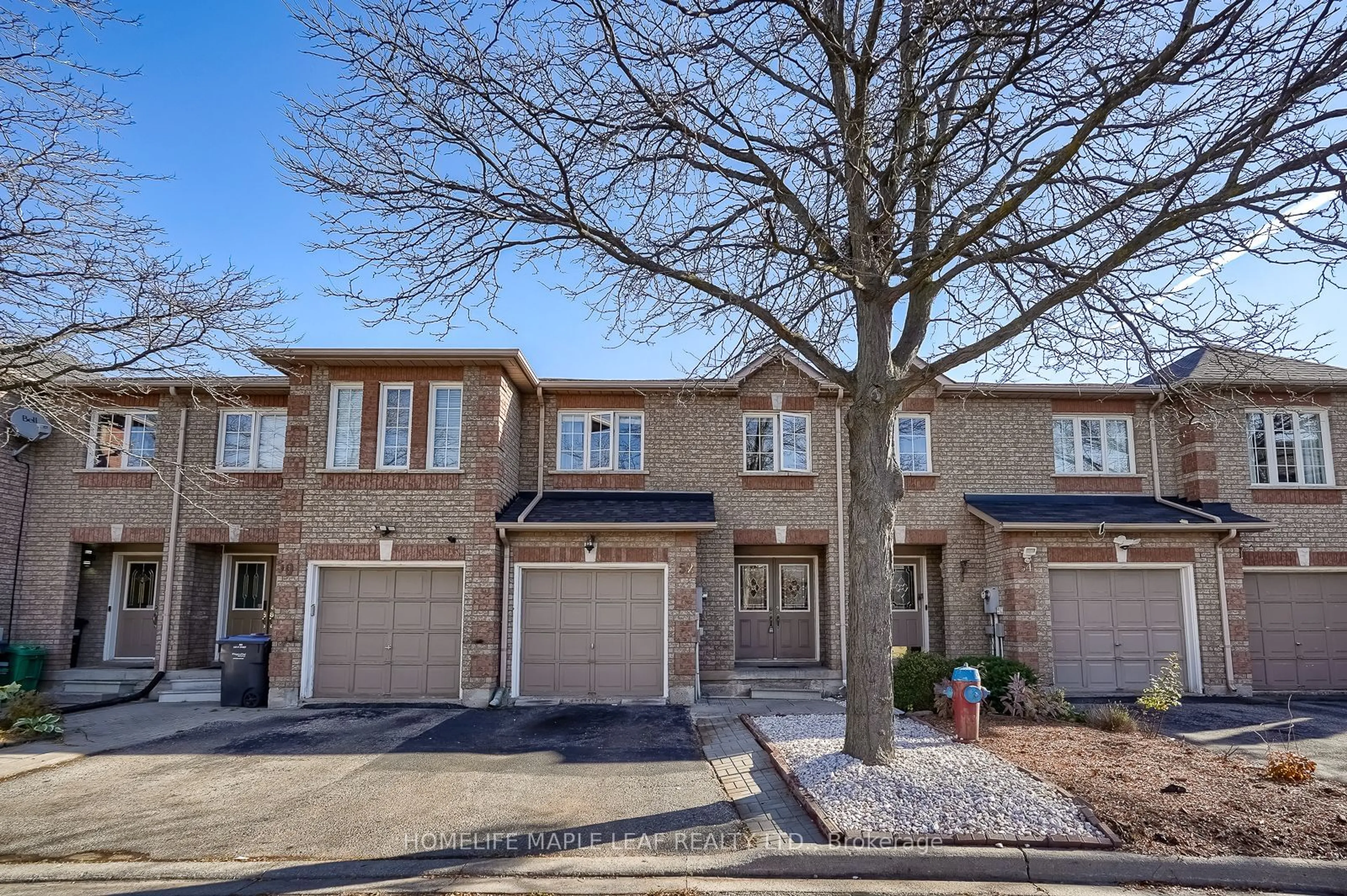 A pic from exterior of the house or condo, the street view for 100 BRICKYARD Way #52, Brampton Ontario L6V 4L9