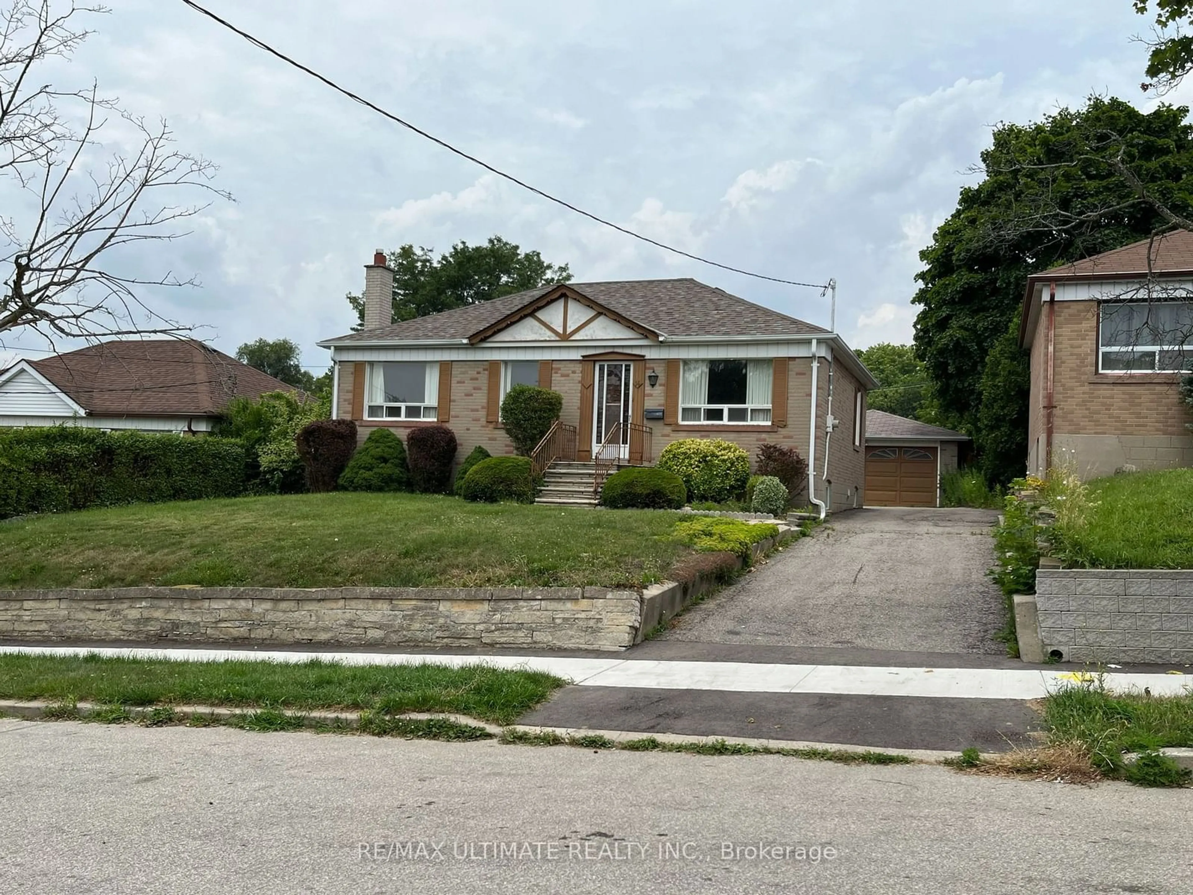 Frontside or backside of a home, the street view for 14 Hawkins Dr, Toronto Ontario M6M 2W6