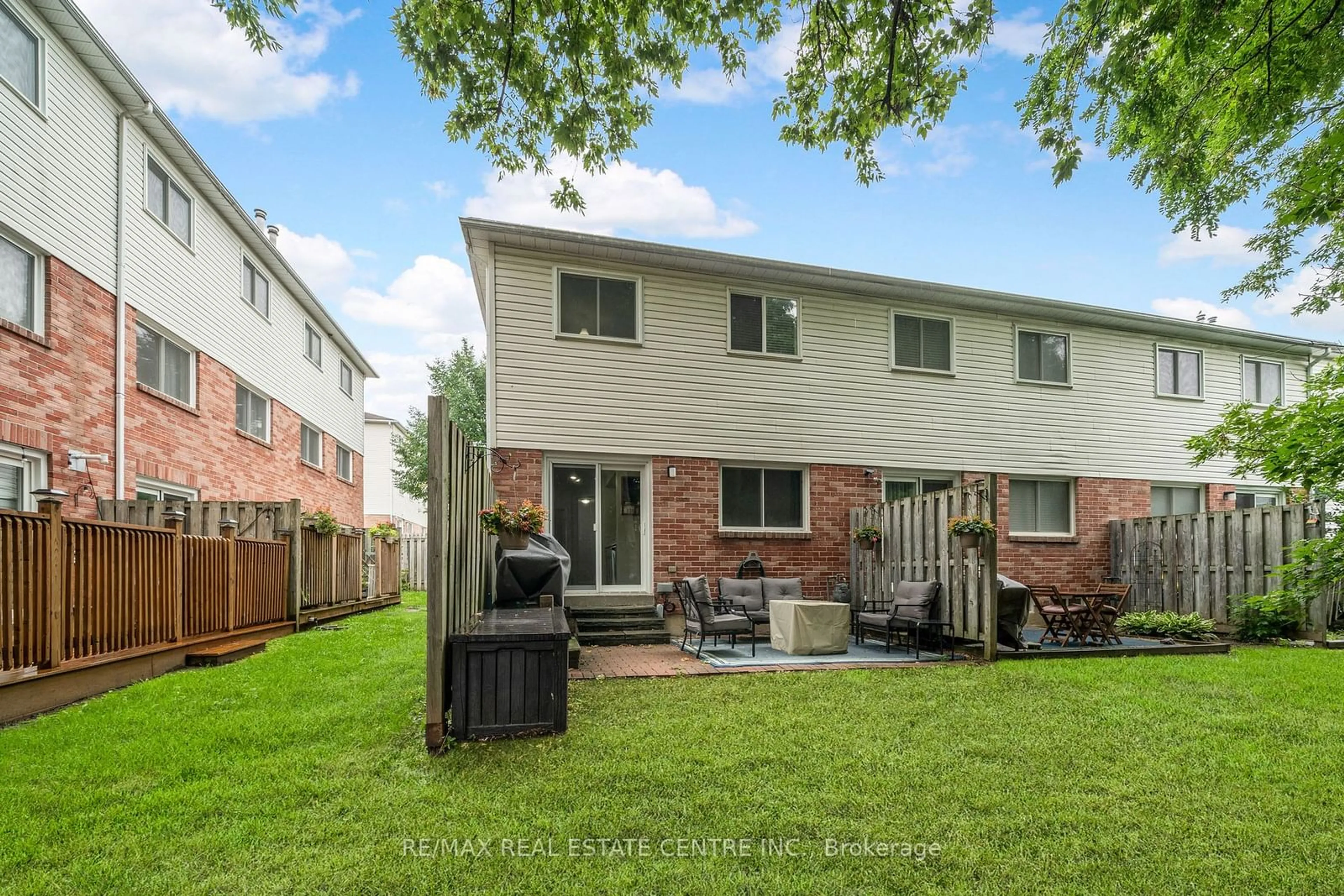 A pic from exterior of the house or condo, the fenced backyard for 95 COREY Circ, Halton Hills Ontario L7G 5L8