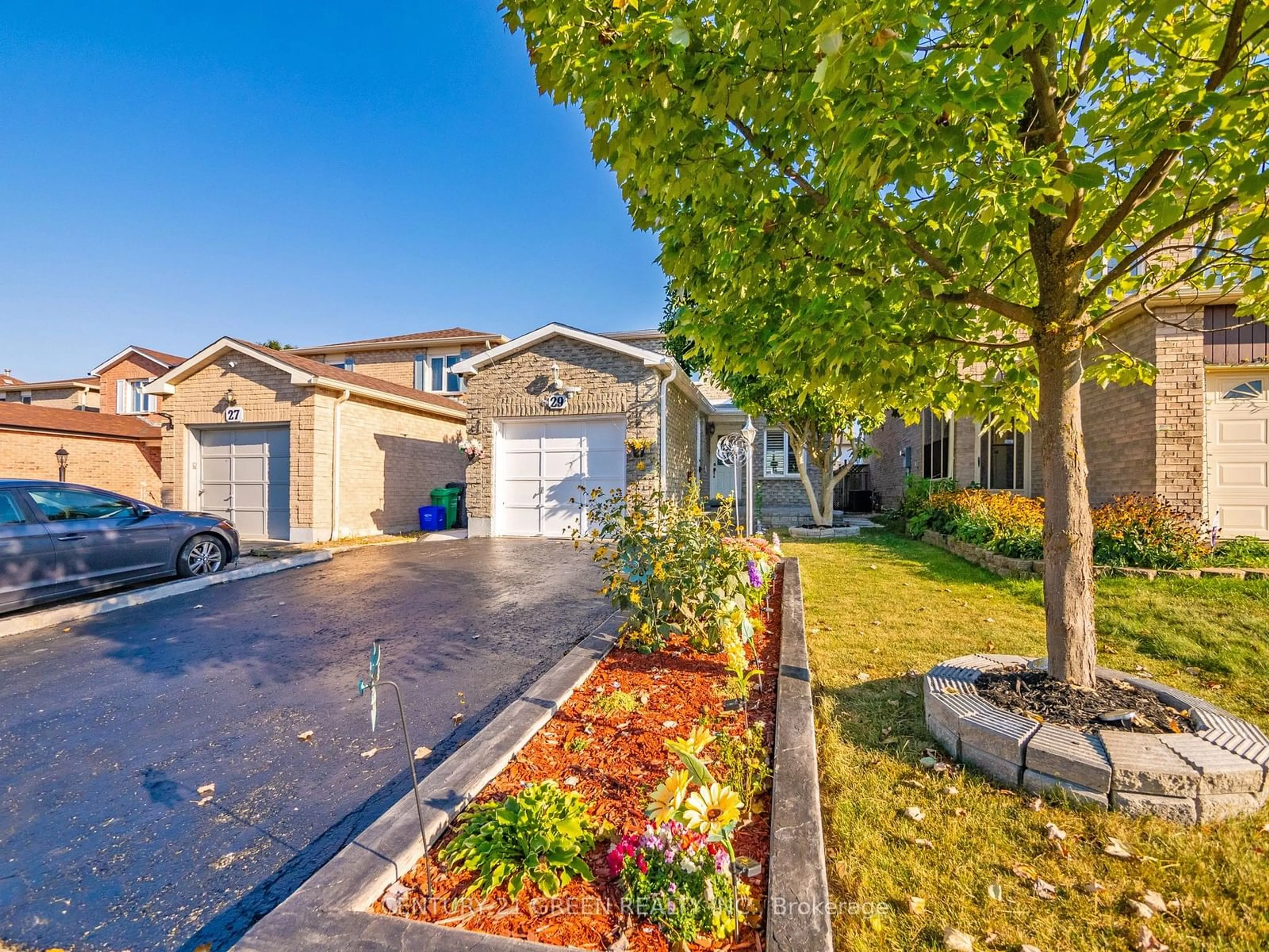 Frontside or backside of a home, the fenced backyard for 29 Stanwell Dr, Brampton Ontario L6Z 3Y7