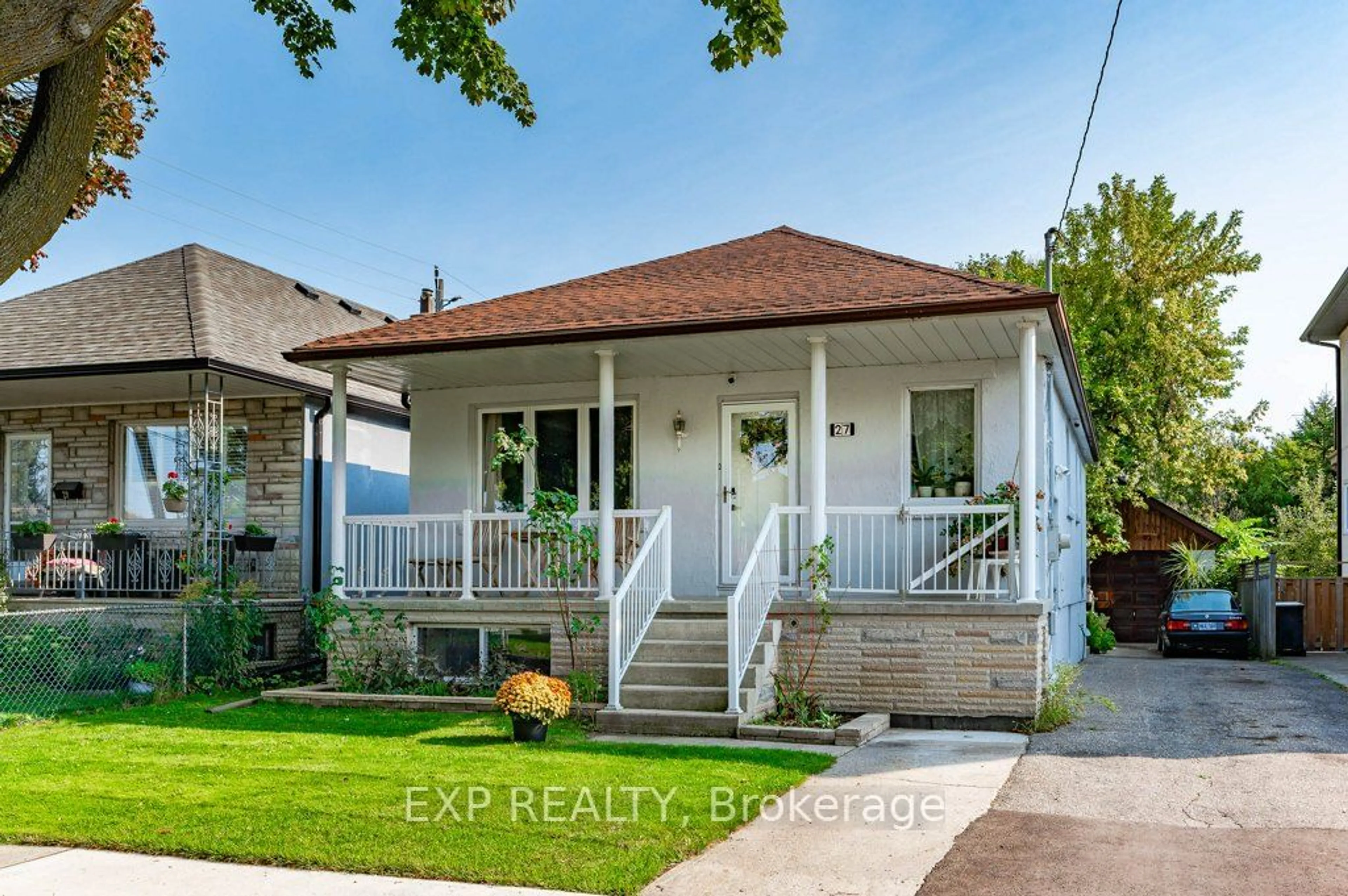 Frontside or backside of a home, cottage for 27 Stock Ave, Toronto Ontario M8Z 5C3