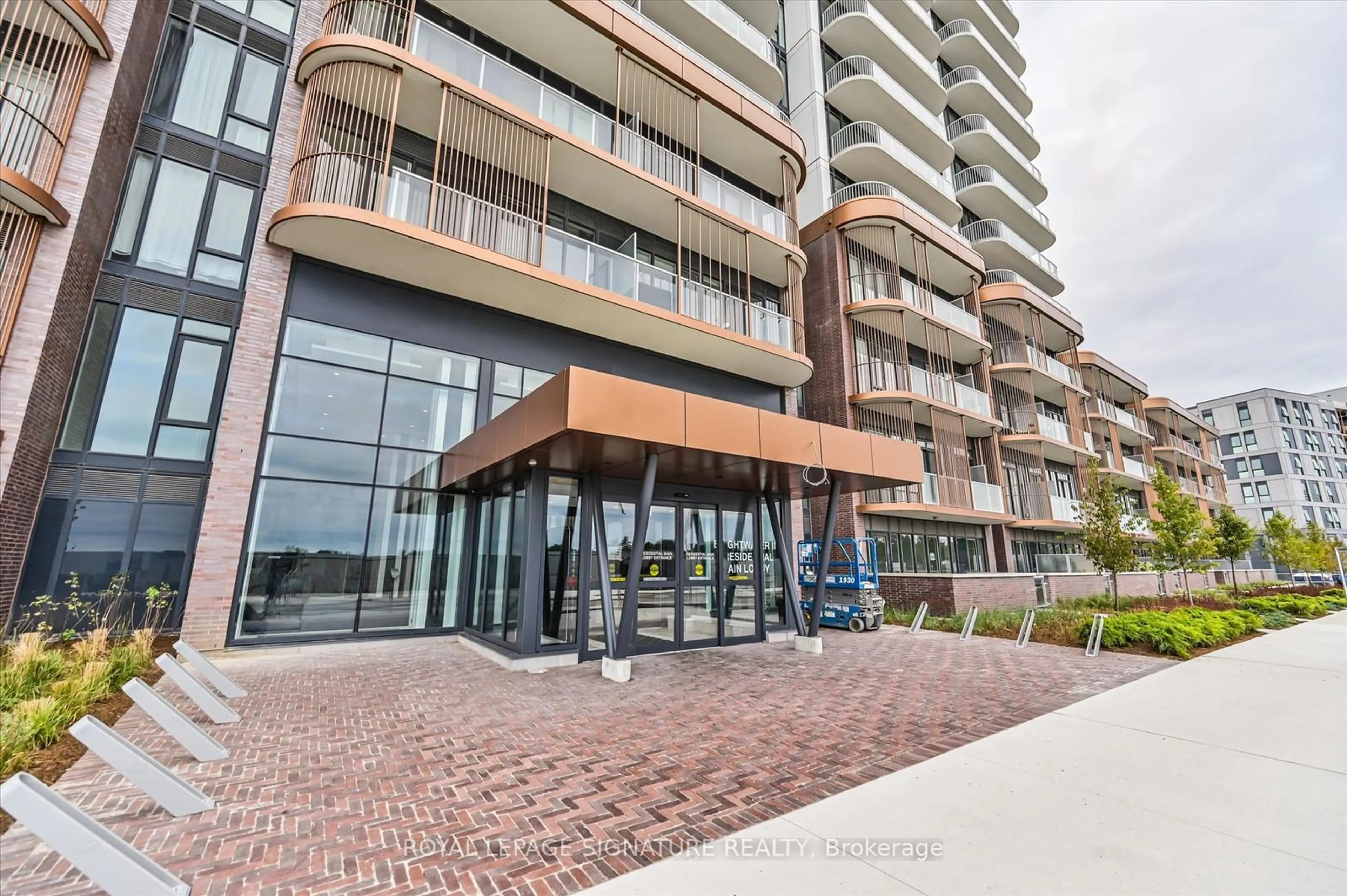 A pic from exterior of the house or condo, the street view for 220 Missinnihe Way #1304, Mississauga Ontario L5H 0A9