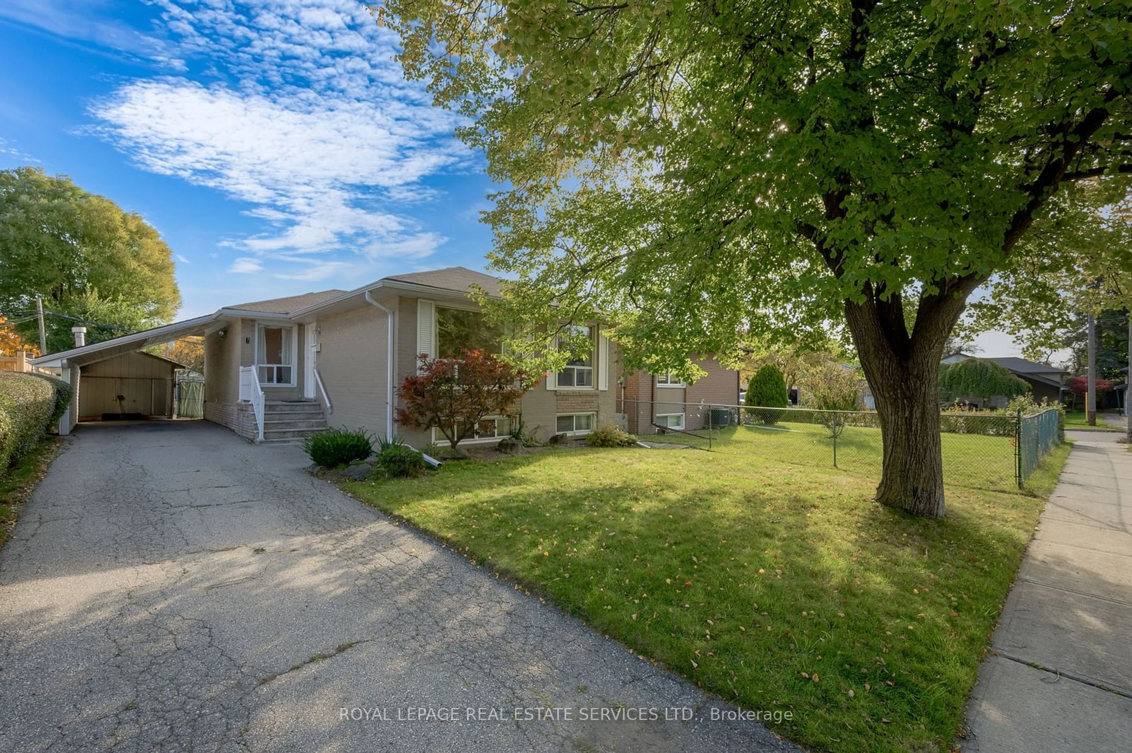 A pic from exterior of the house or condo, the fenced backyard for 3 Hardwick Crt, Toronto Ontario M9C 4G5