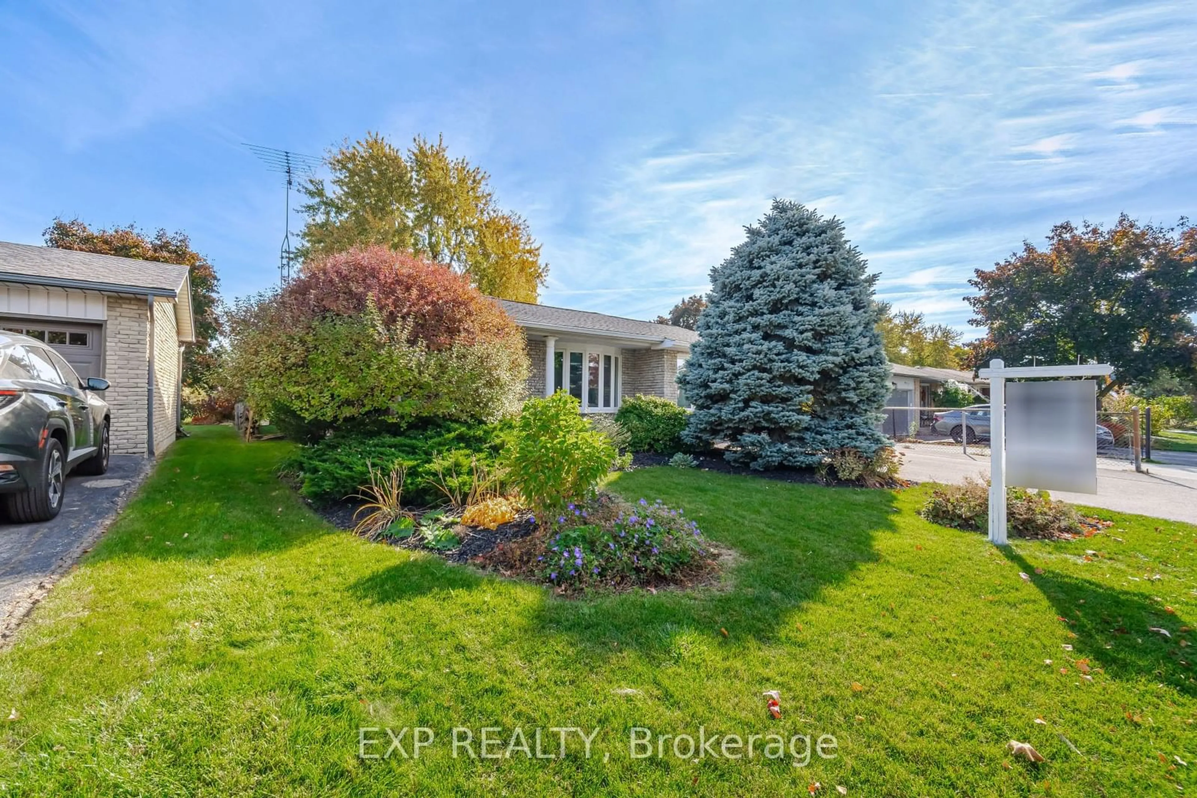 Frontside or backside of a home, the fenced backyard for 853 Willow Ave, Milton Ontario L9T 3E5