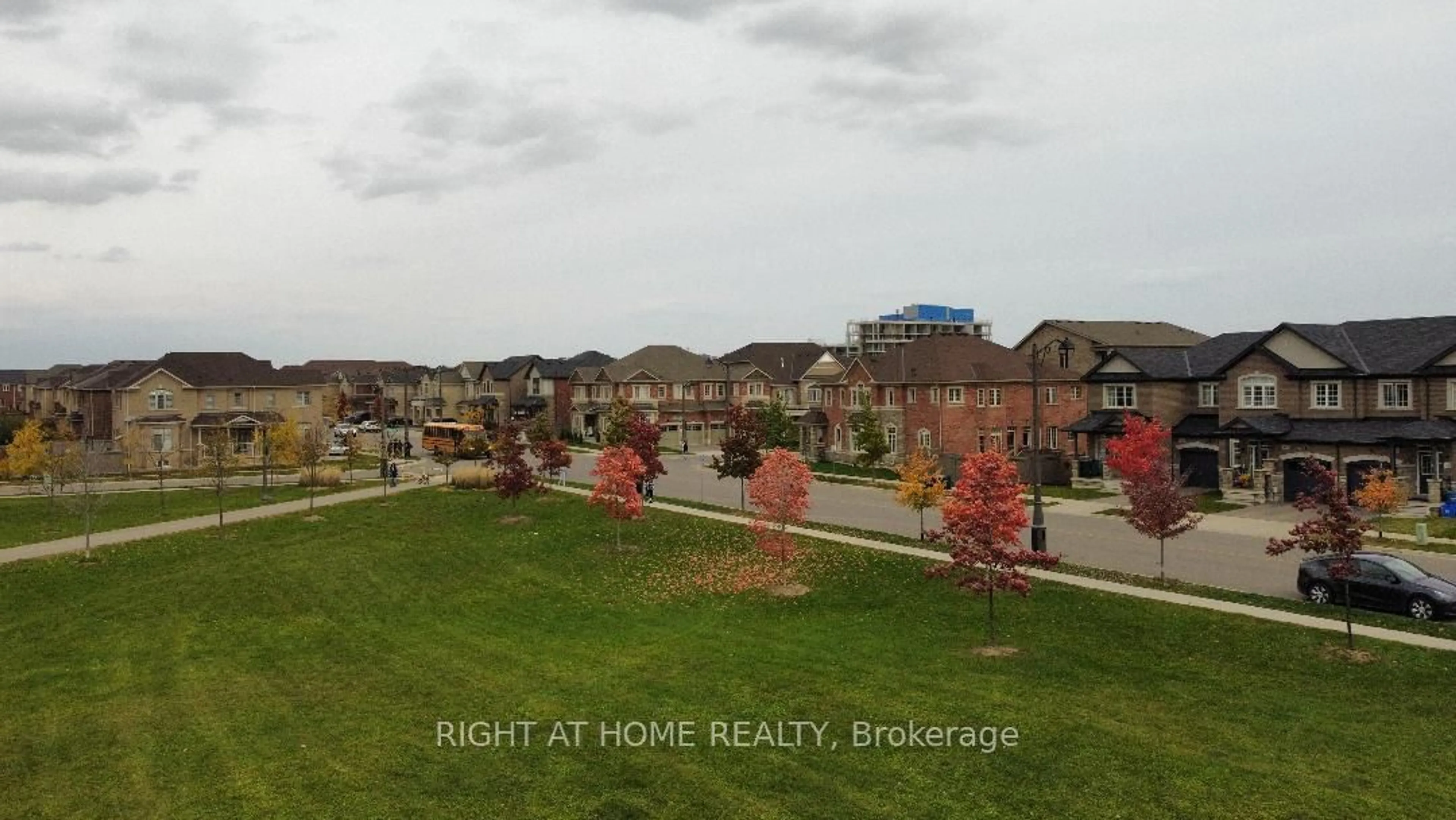 Frontside or backside of a home, the street view for 3027 Max Khan Blvd, Oakville Ontario L6H 0S4