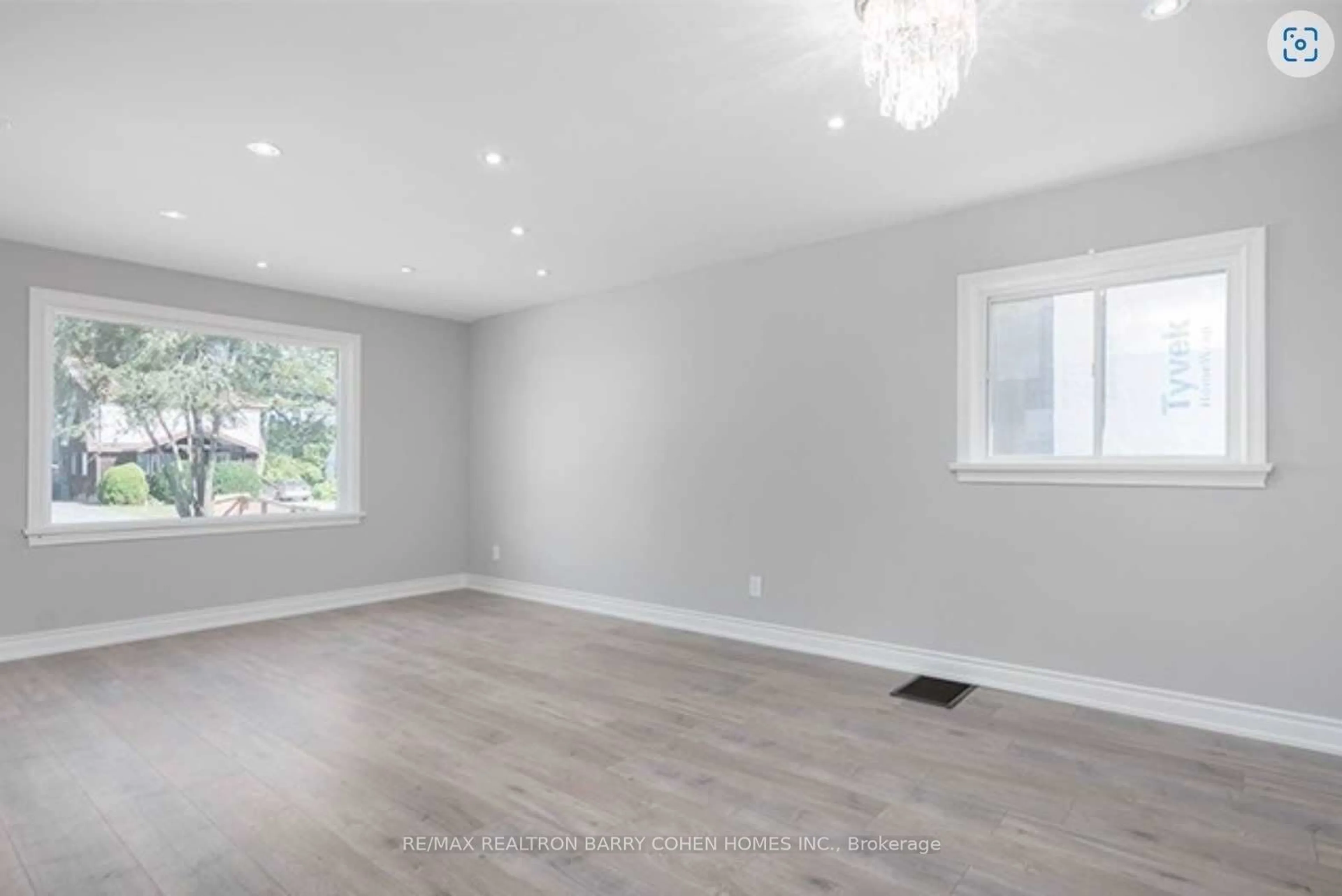 A pic of a room, wood floors for 15 Delroy Dr, Toronto Ontario M8Y 1M8