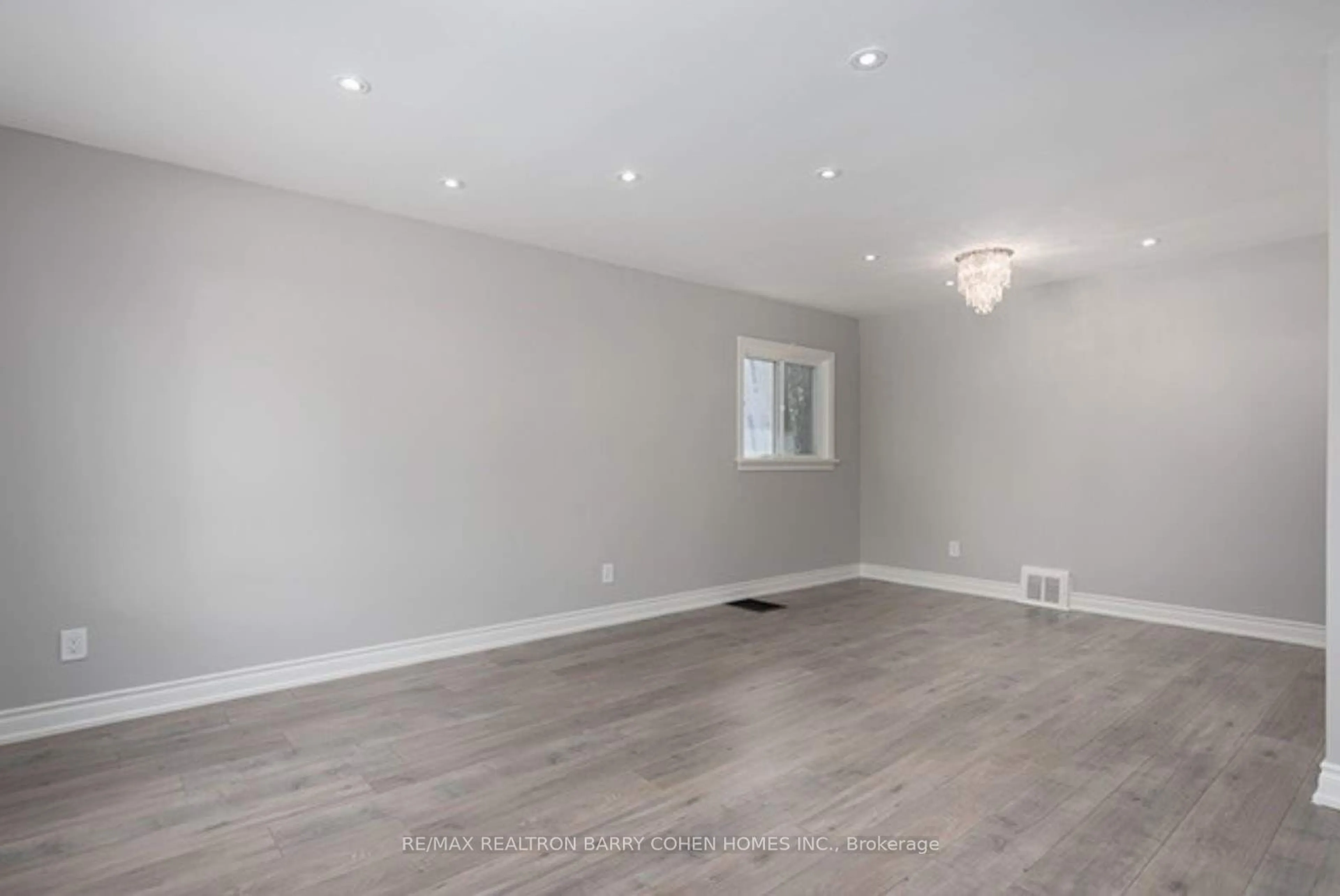 A pic of a room, wood floors for 15 Delroy Dr, Toronto Ontario M8Y 1M8