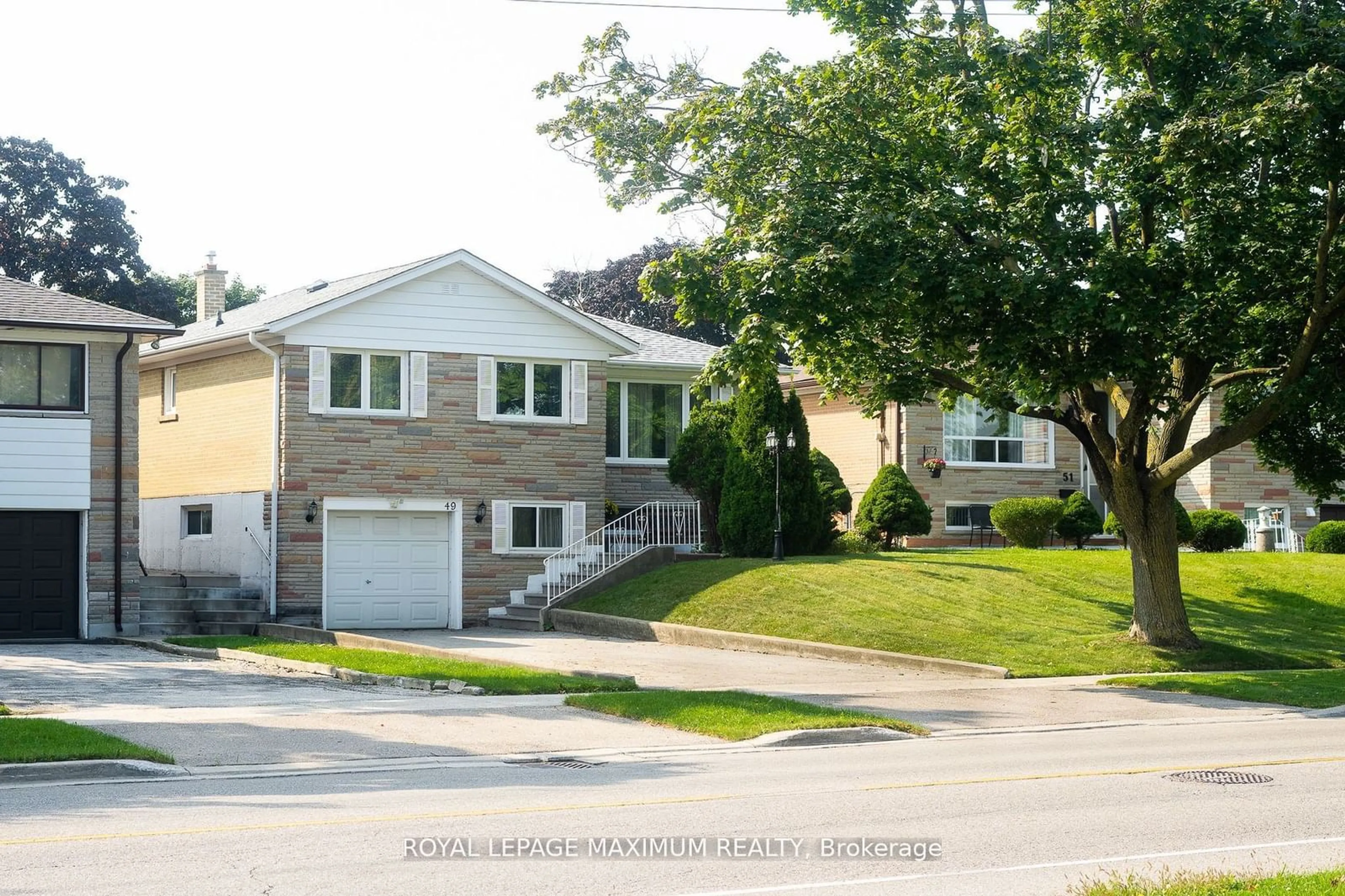 Frontside or backside of a home, the street view for 49 Westhumber Blvd, Toronto Ontario M9W 3M7