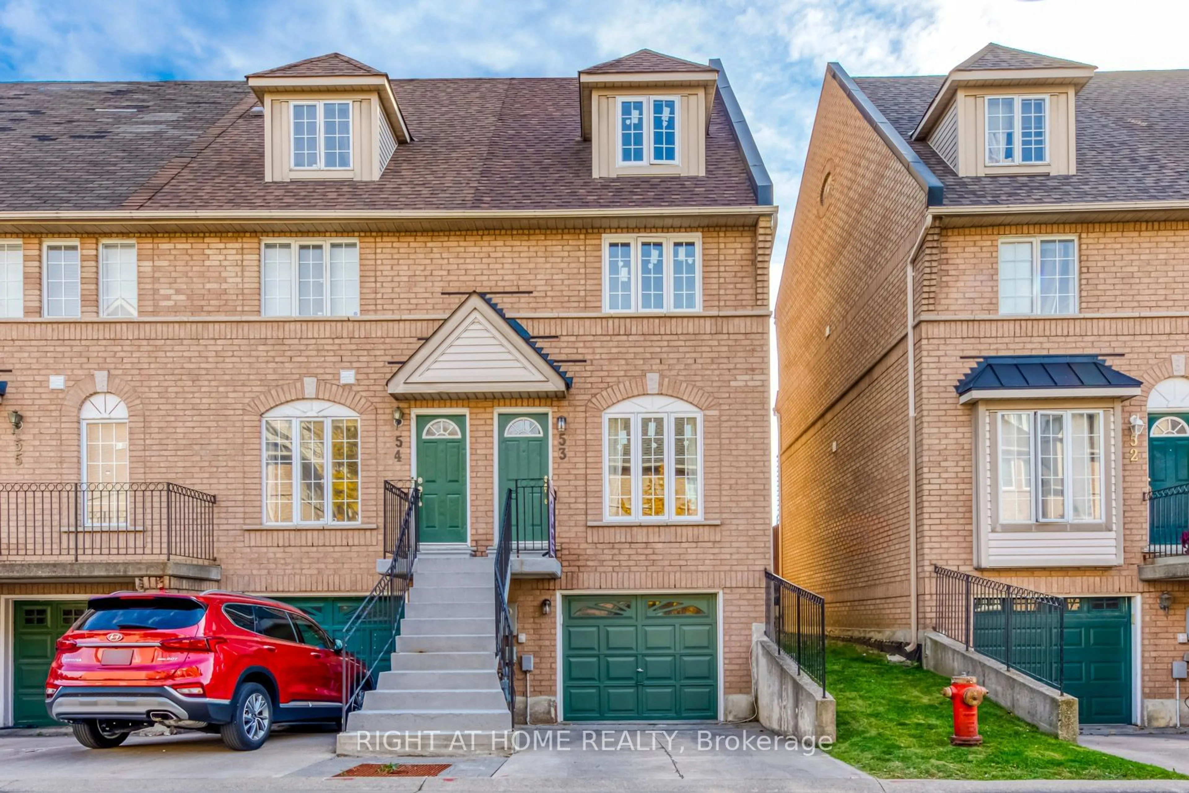 A pic from exterior of the house or condo, the street view for 75 Strathaven Dr #53, Mississauga Ontario L5R 3W1