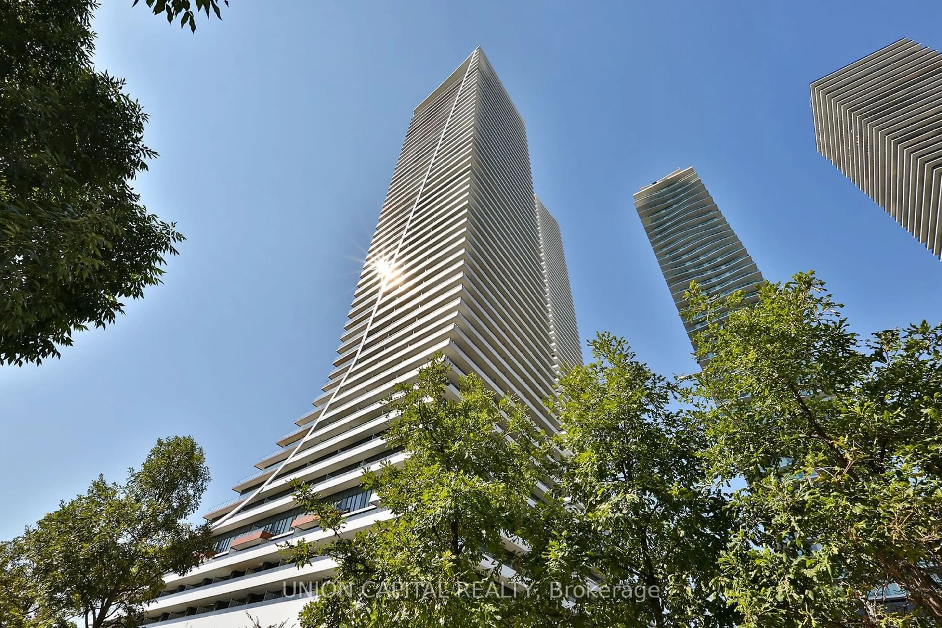 A pic from exterior of the house or condo, the view of city buildings for 20 Shore Breeze Dr #LPH02B, Toronto Ontario M8V 1A1