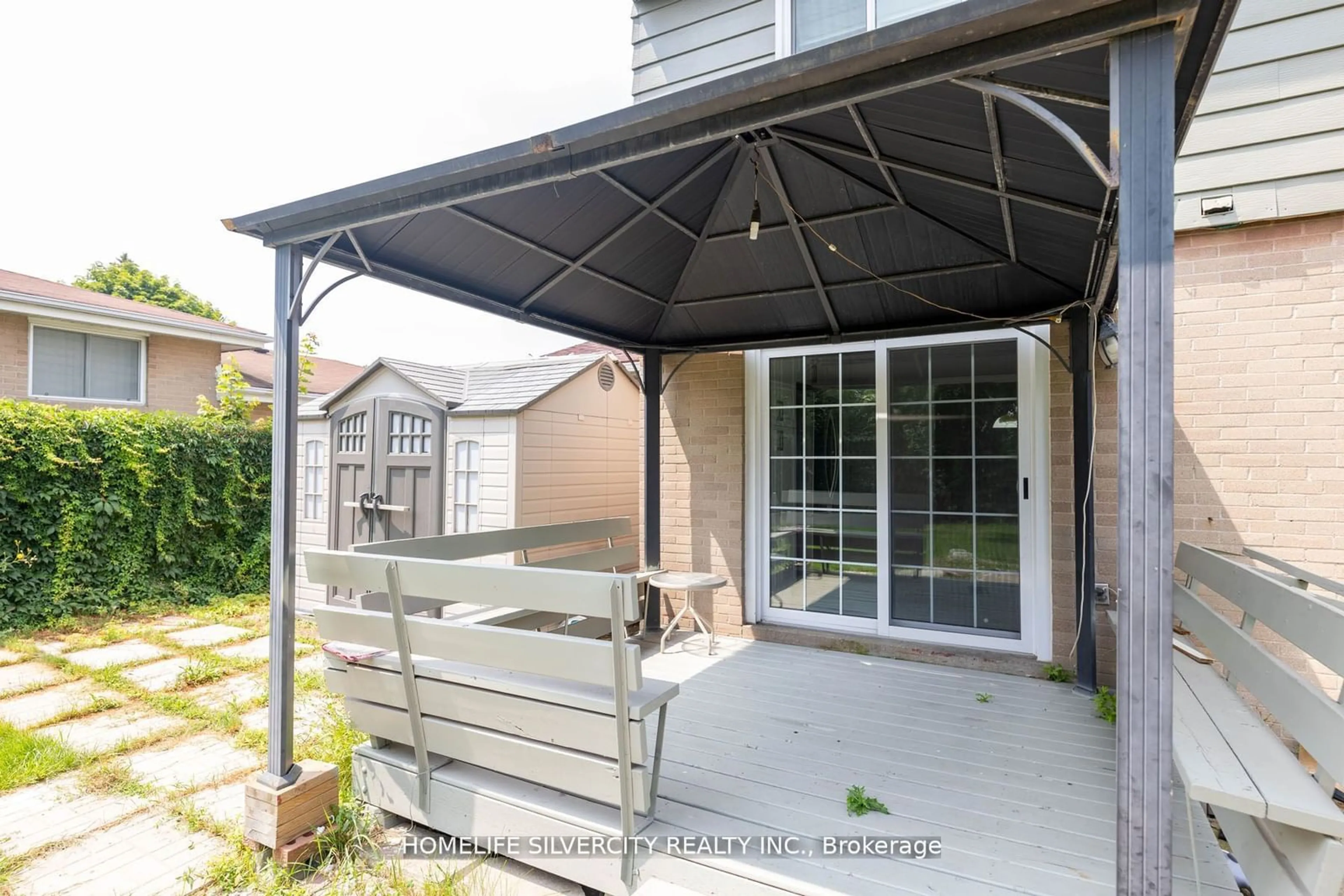 Patio, the fenced backyard for 8 Bedford Cres, Brampton Ontario L6T 1R4