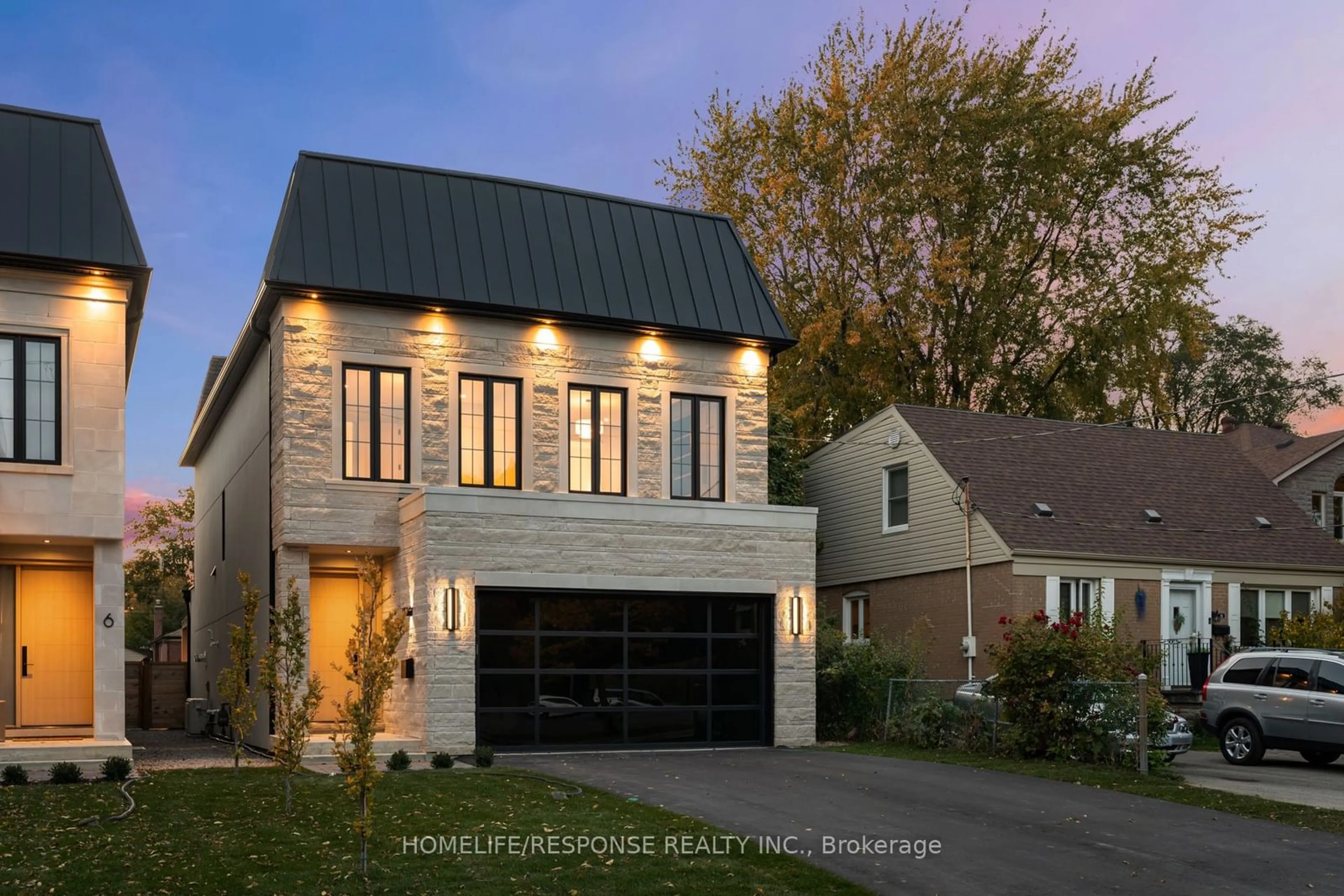 Home with brick exterior material for 8 MARTIN GROVE Rd, Toronto Ontario M9V 4A3