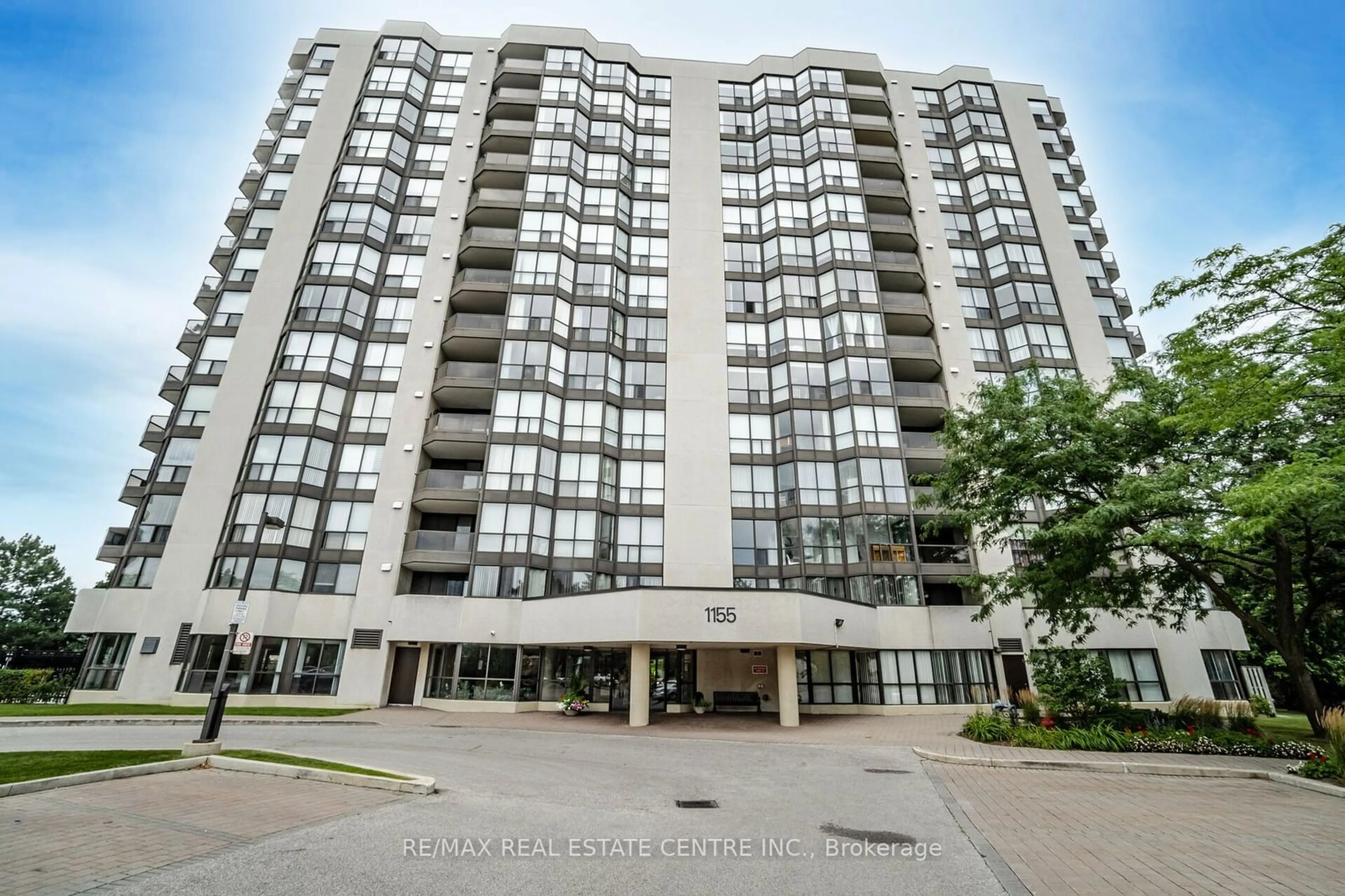 A pic from exterior of the house or condo, the front or back of building for 1155 Bough Beeches Blvd #208, Mississauga Ontario L4W 4N2