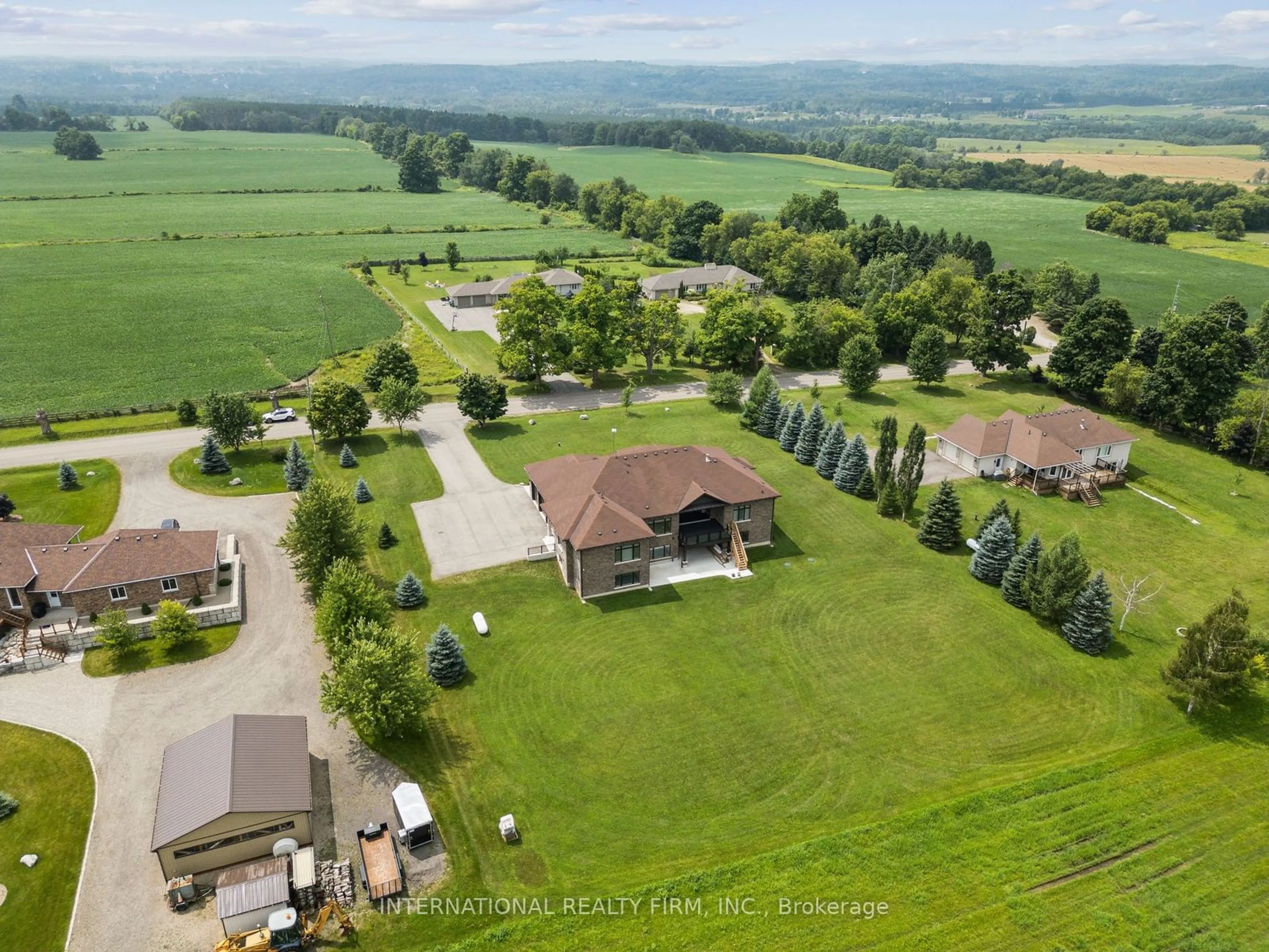 Frontside or backside of a home, the fenced backyard for 19769 Willoughby Rd, Caledon Ontario L7K 1V9