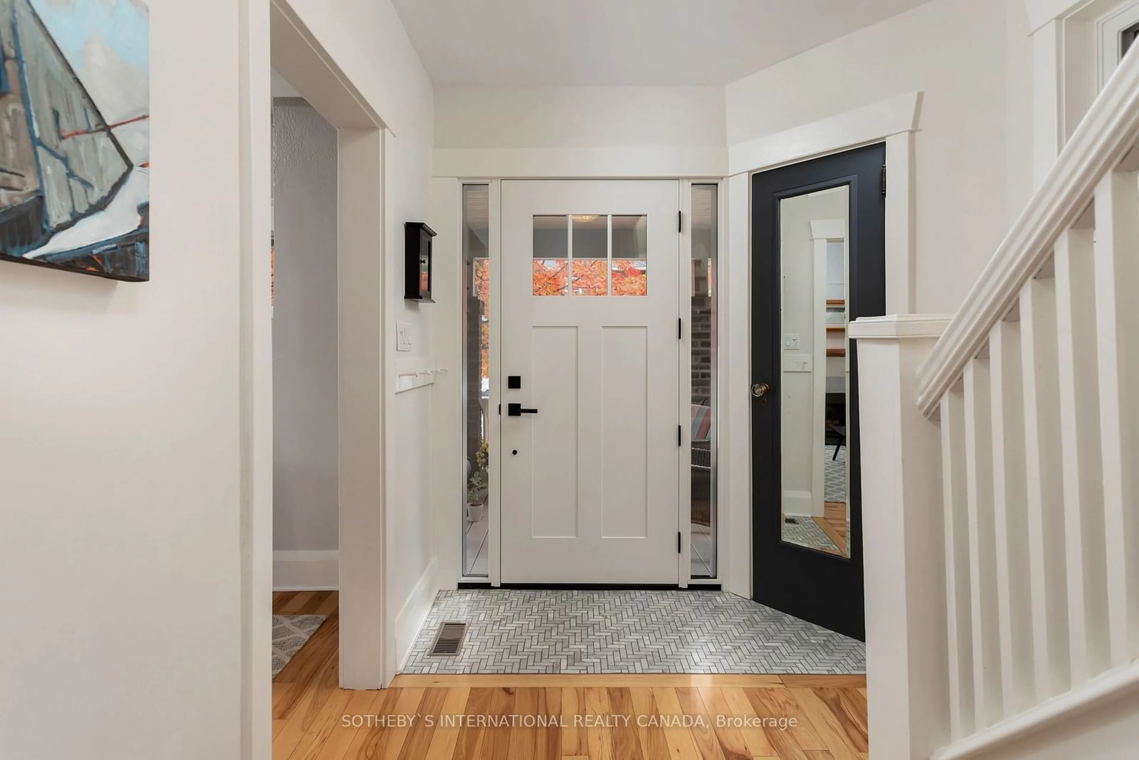 Indoor entryway, wood floors for 14 Lessard Ave, Toronto Ontario M6S 1X5