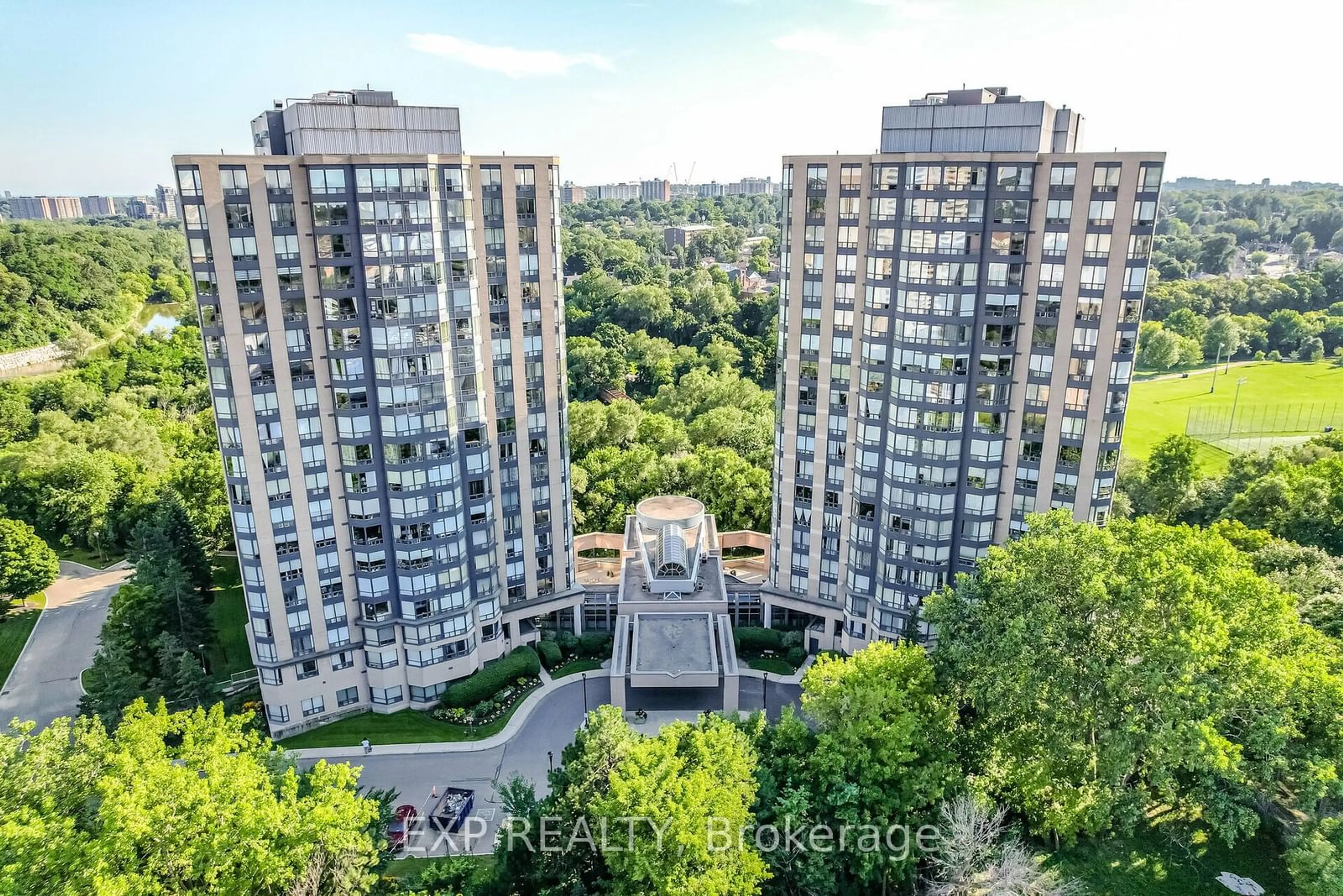 A pic from exterior of the house or condo, the view of city buildings for 1 Hickory Tree Rd #401, Toronto Ontario M9N 3W4