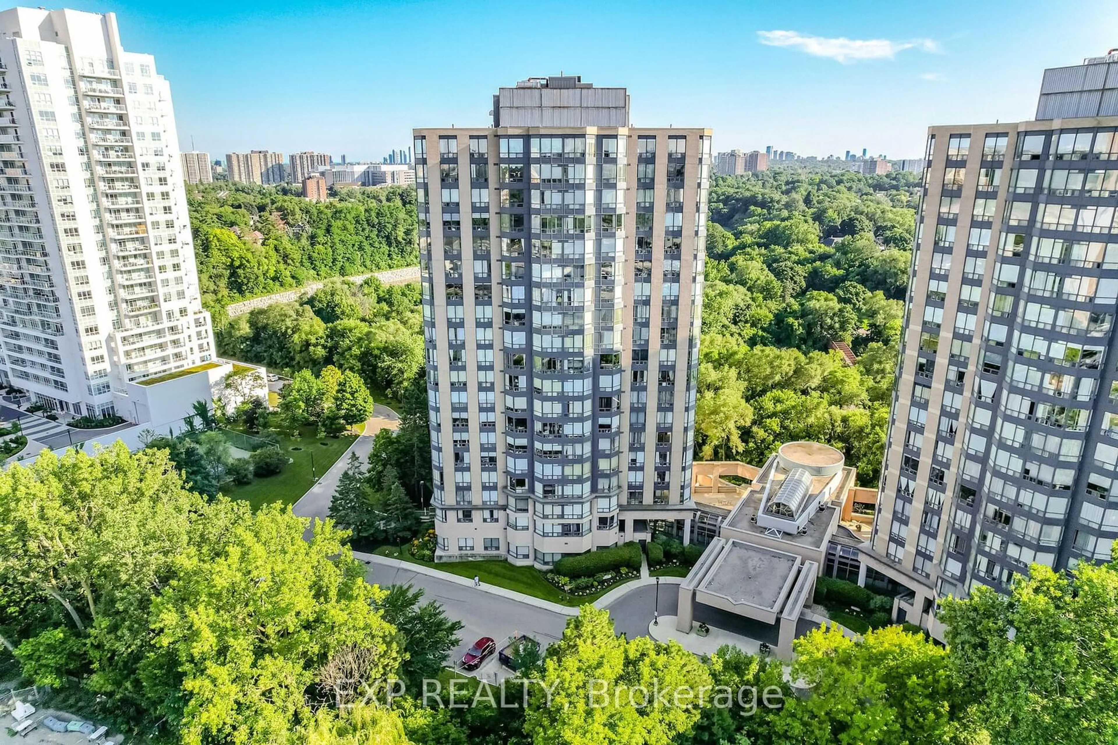 A pic from exterior of the house or condo, the view of city buildings for 1 Hickory Tree Rd #401, Toronto Ontario M9N 3W4