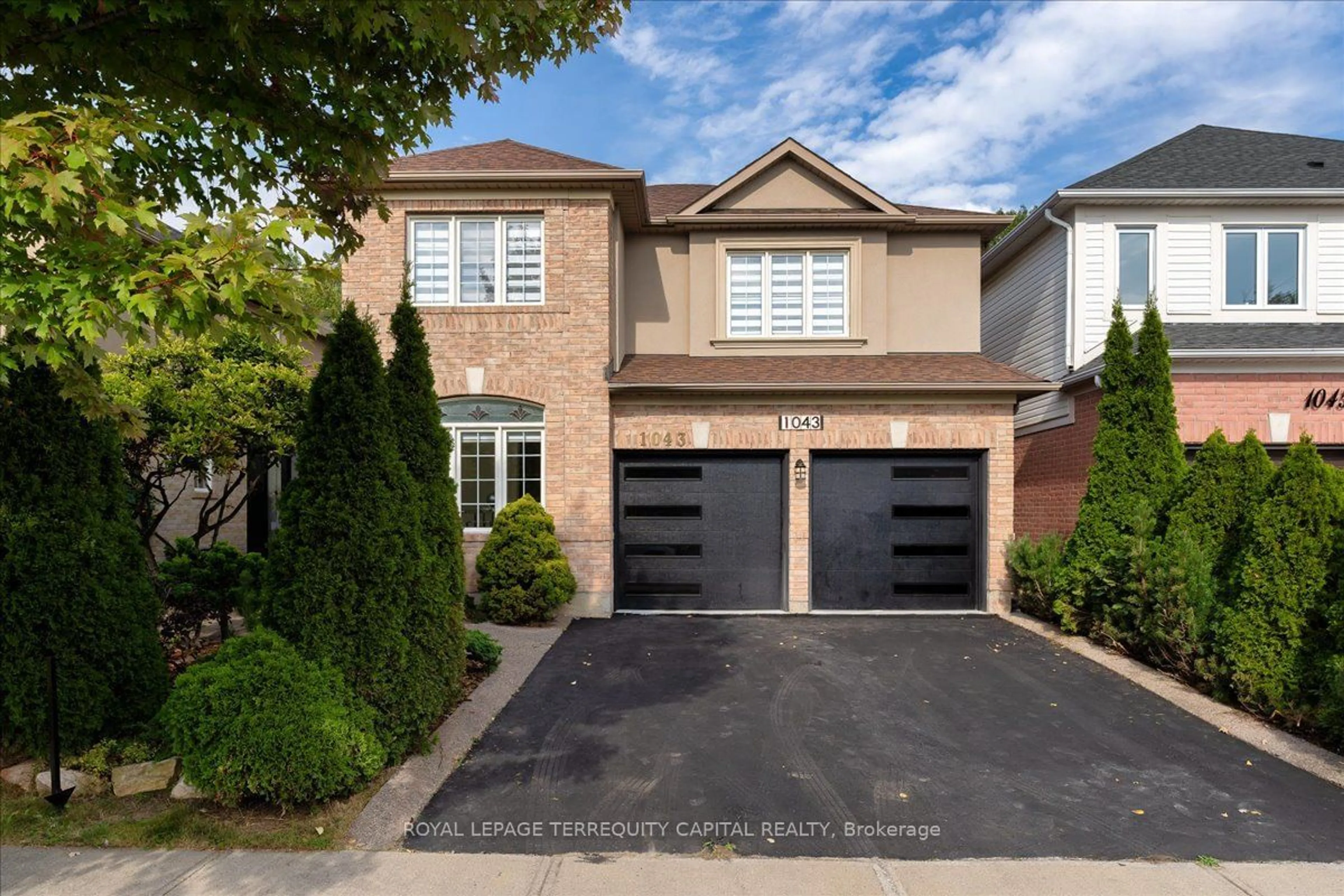 Frontside or backside of a home, the street view for 1043 Freeman Tr, Milton Ontario L9T 5T3