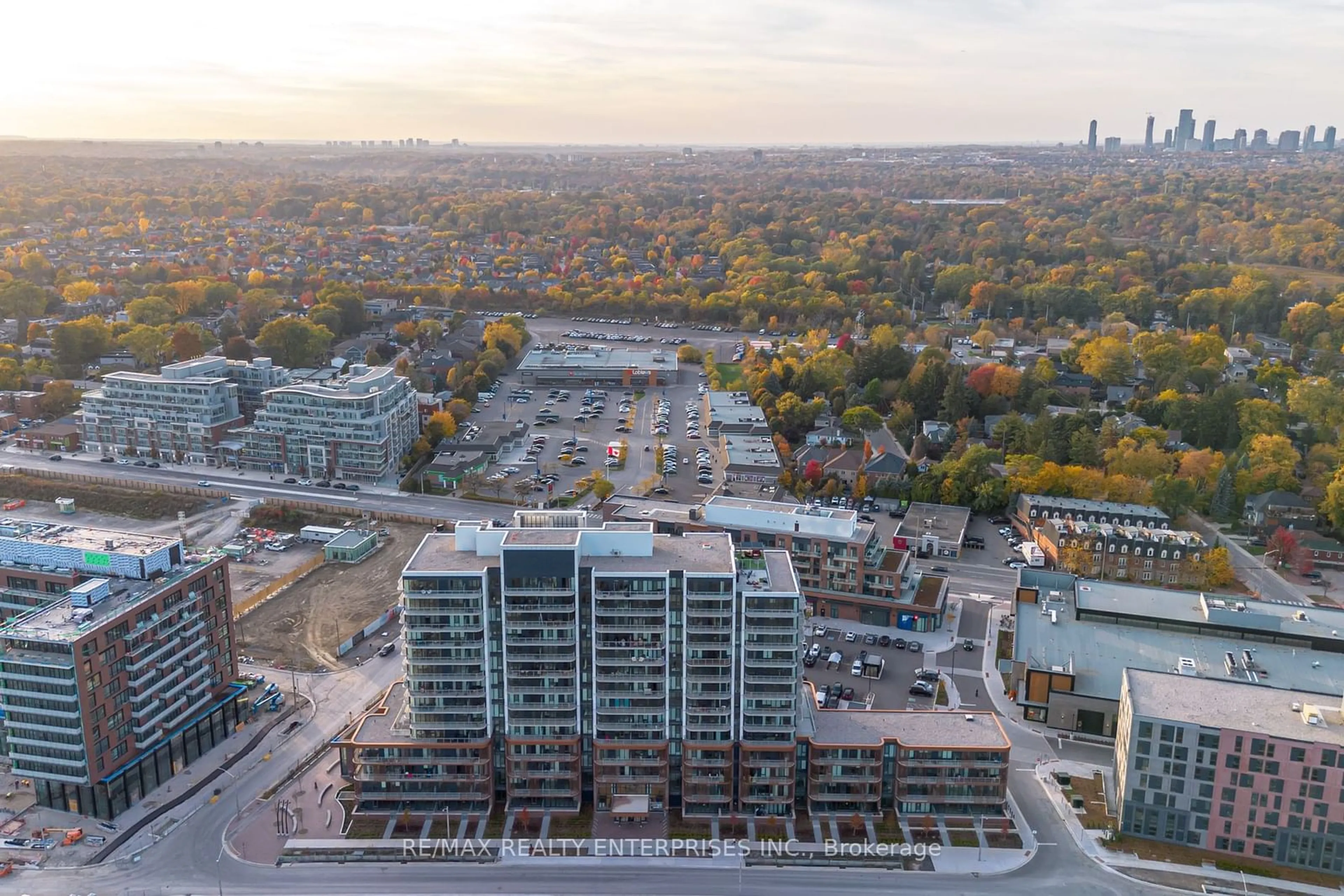 A pic from exterior of the house or condo, the view of city buildings for 220 Missinnihe Way #110, Mississauga Ontario L5H 0A9