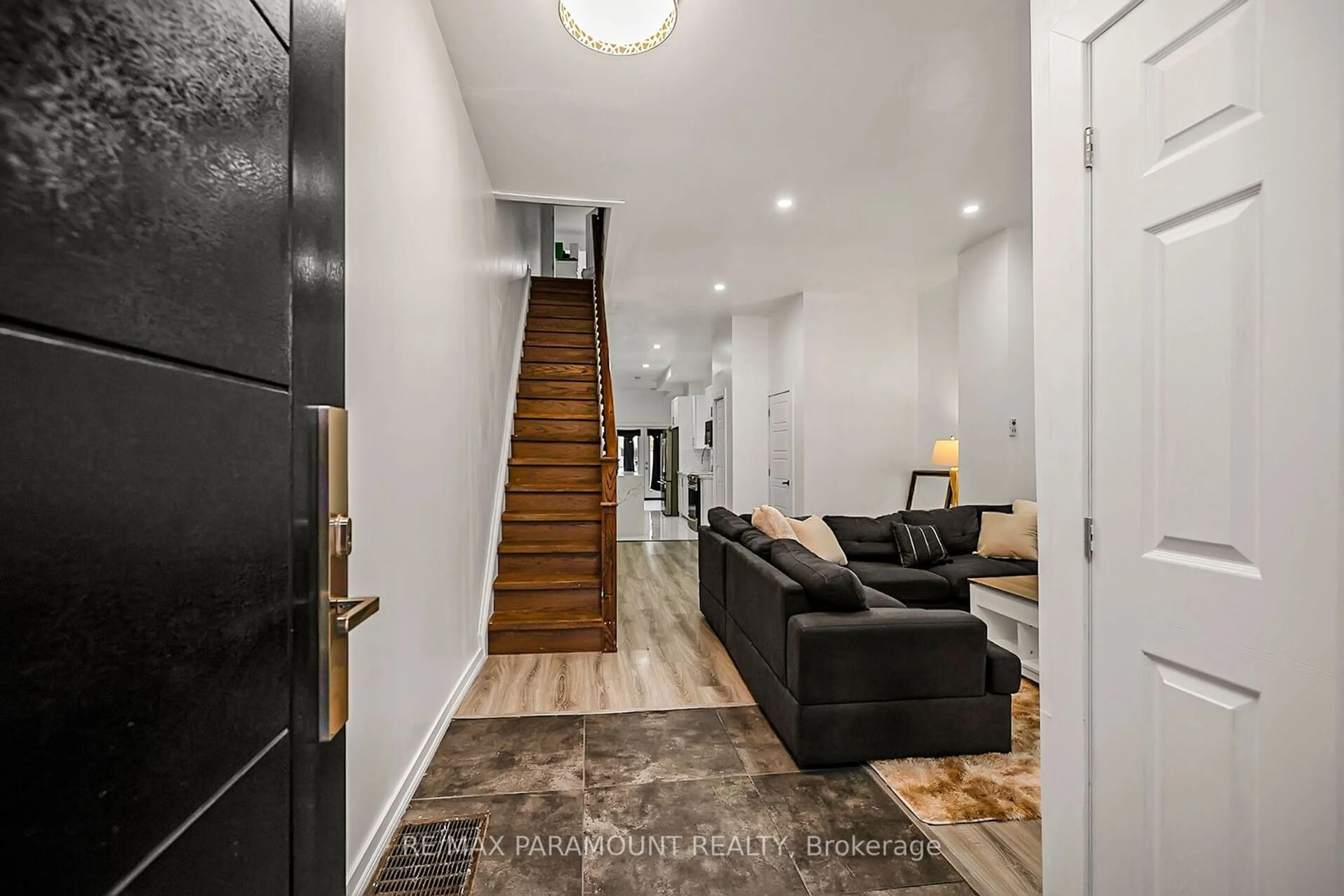 Indoor foyer, wood floors for 121 Mulock Ave, Toronto Ontario M6N 3C5