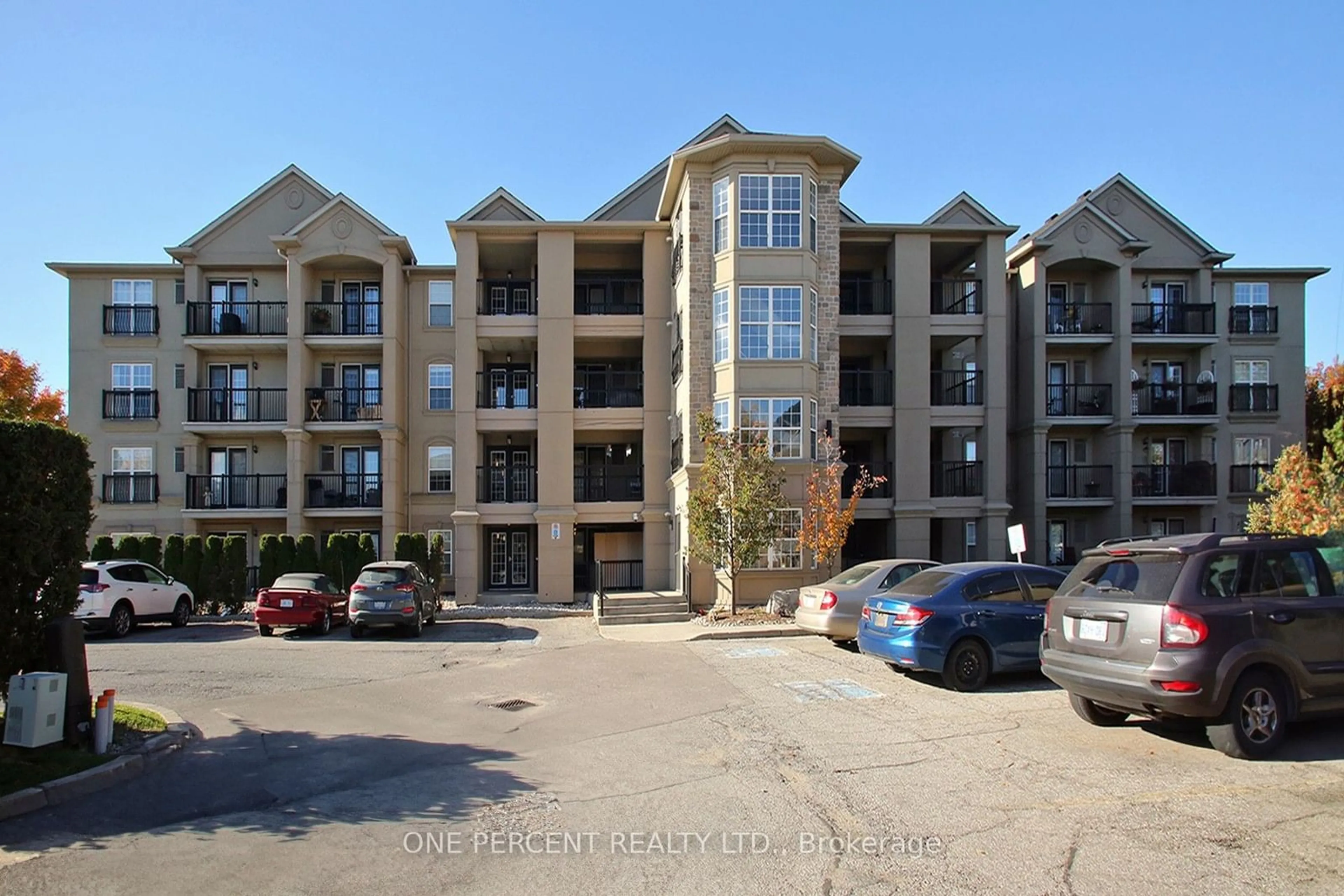 A pic from exterior of the house or condo, the front or back of building for 1471 Maple Ave #311, Milton Ontario L9T 0B4