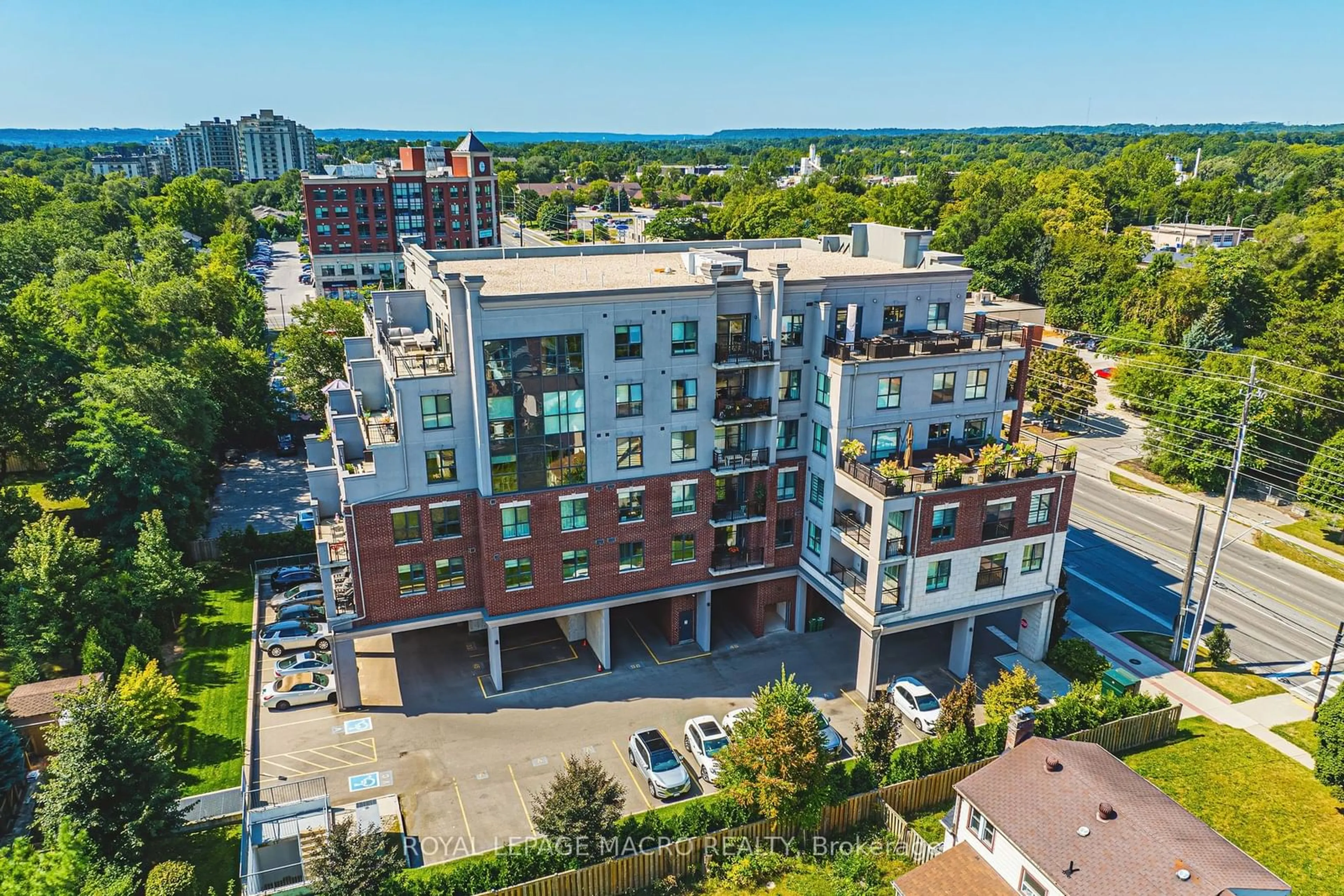 A pic from exterior of the house or condo, the front or back of building for 34 Plains Rd #208, Burlington Ontario L7T 0B9