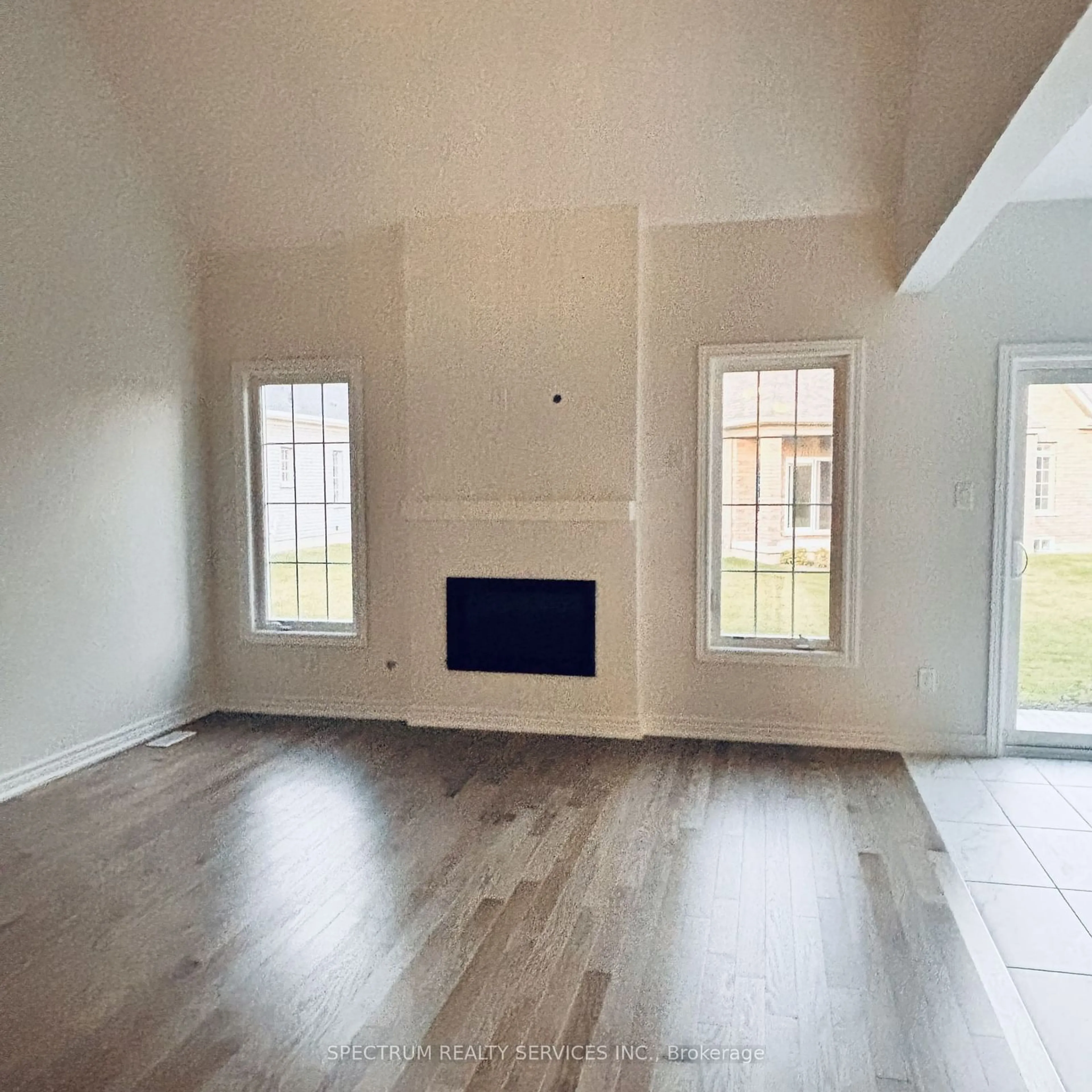 A pic of a room, wood floors for 83 Muzzo Dr, Brampton Ontario L6R 3Y4