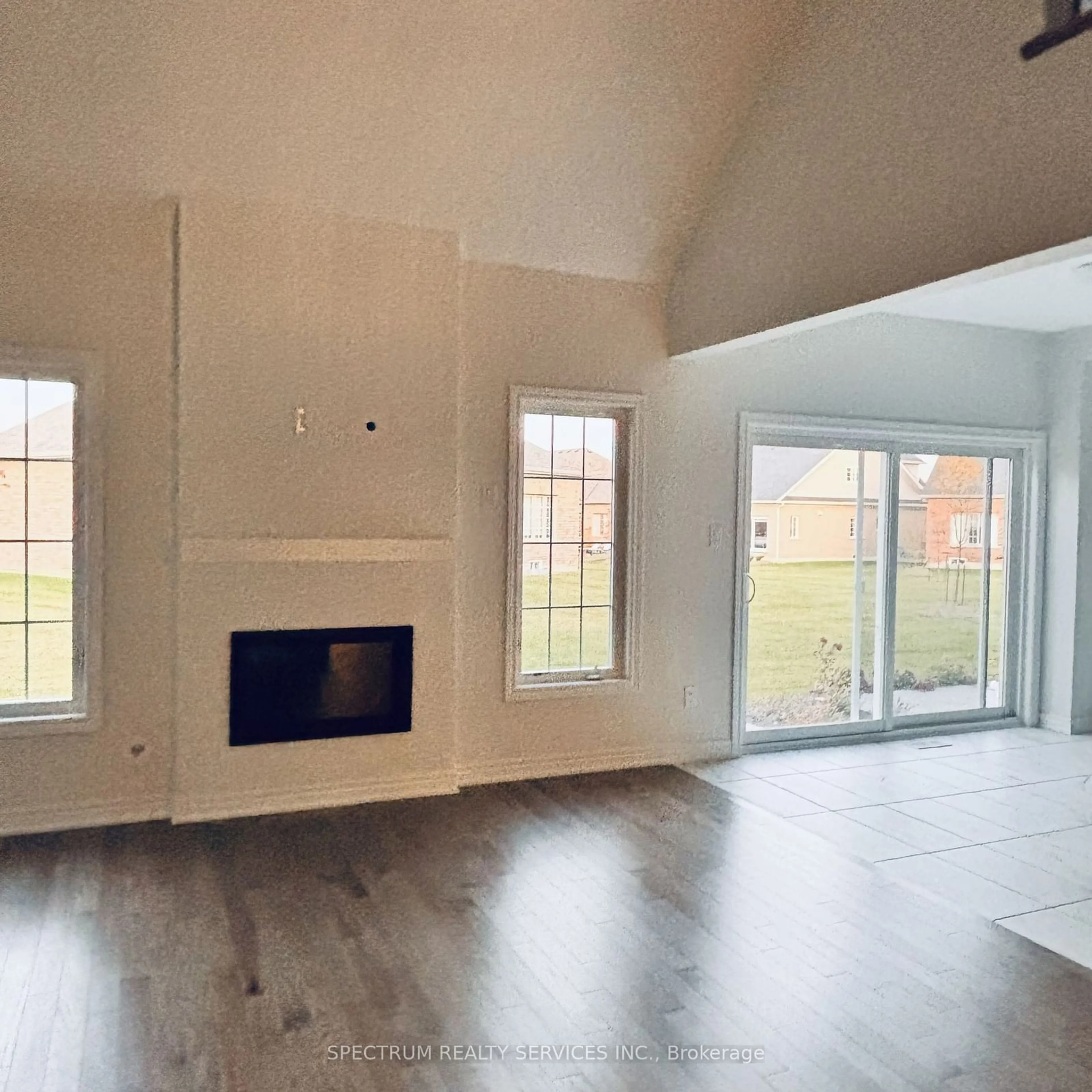 A pic of a room, wood floors for 83 Muzzo Dr, Brampton Ontario L6R 3Y4