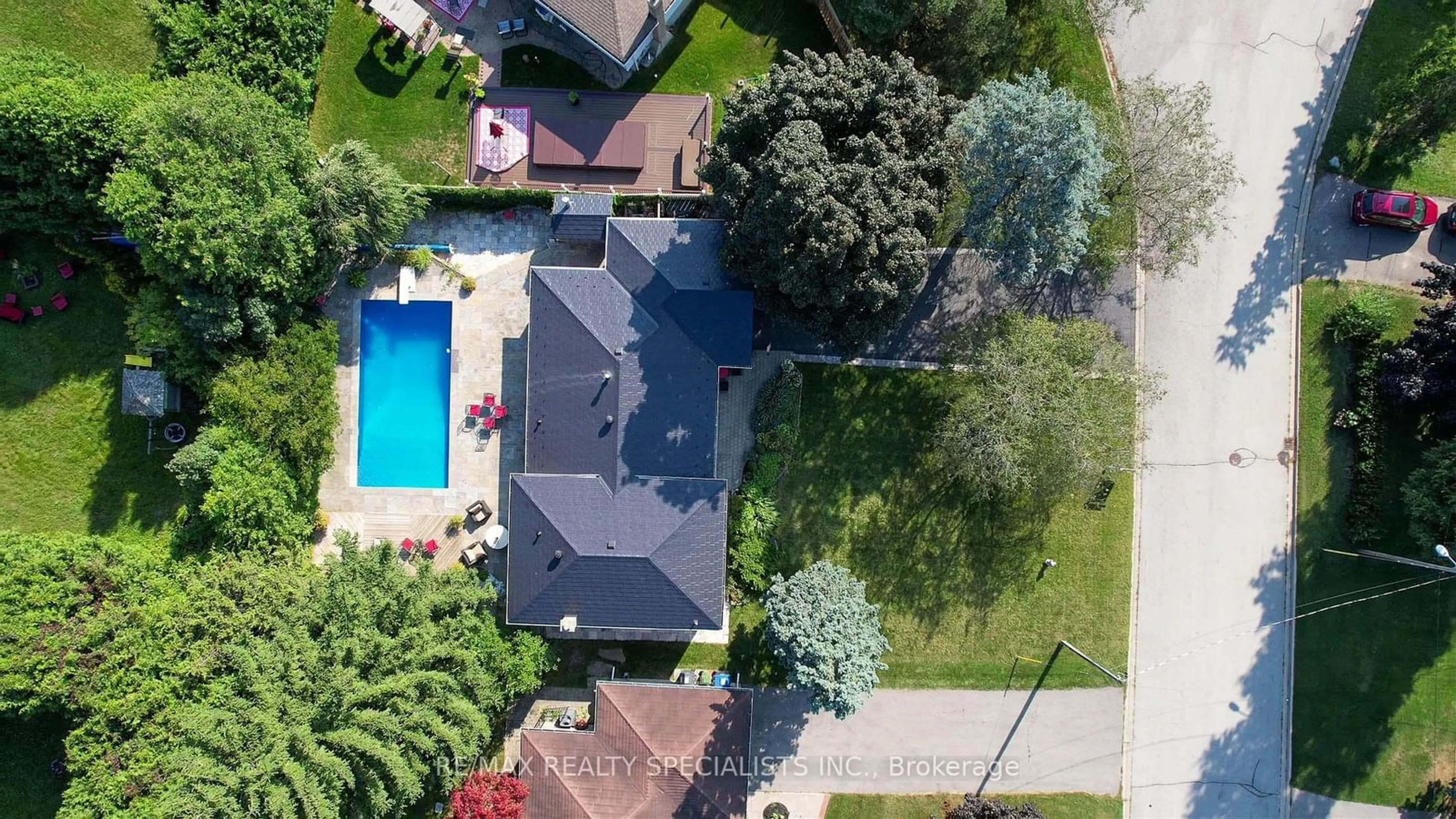 Frontside or backside of a home, the fenced backyard for 28 Larry St, Caledon Ontario L7C 1K8