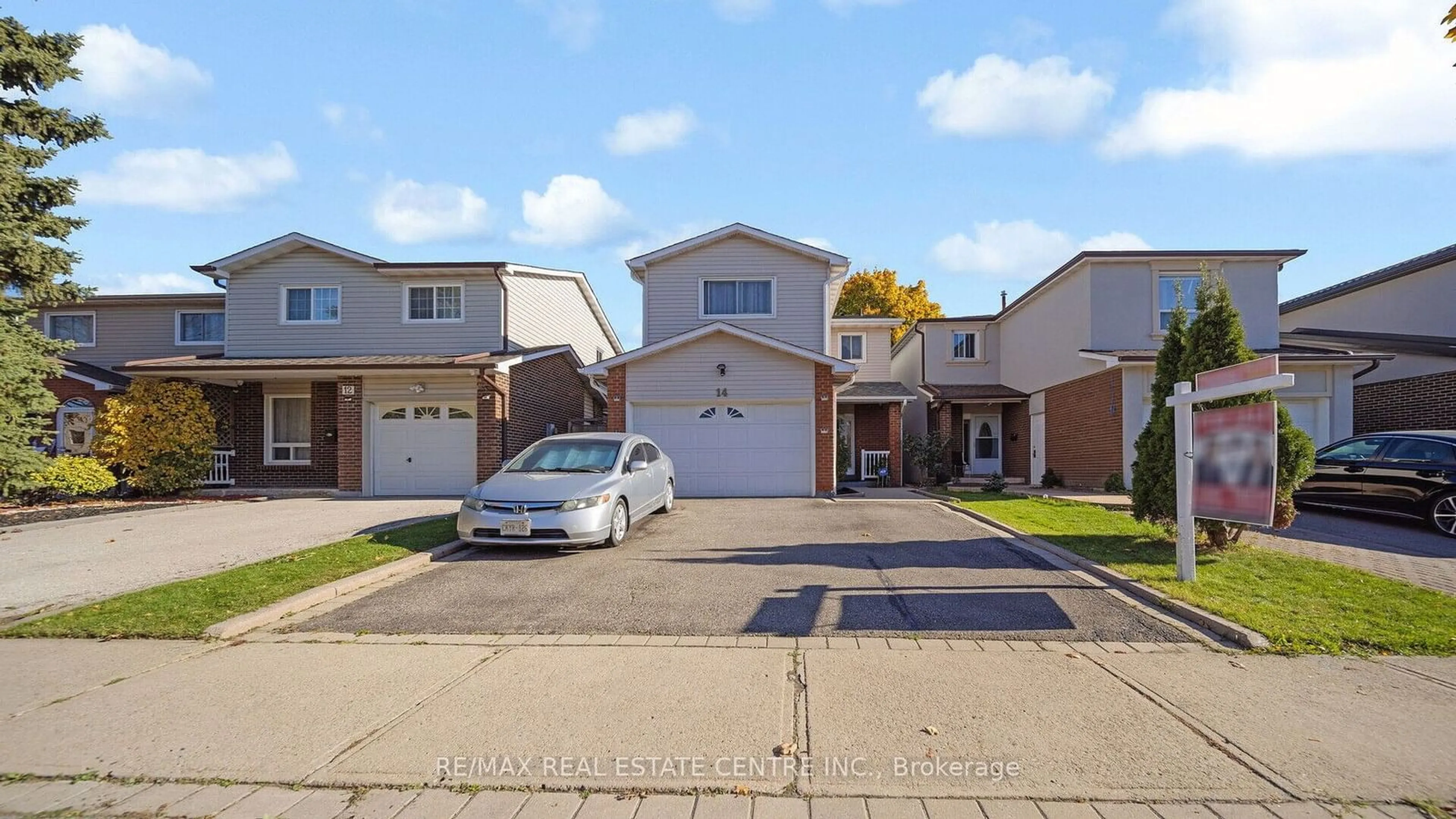 A pic from exterior of the house or condo, the street view for 14 Simmons Blvd, Brampton Ontario L6V 3V5