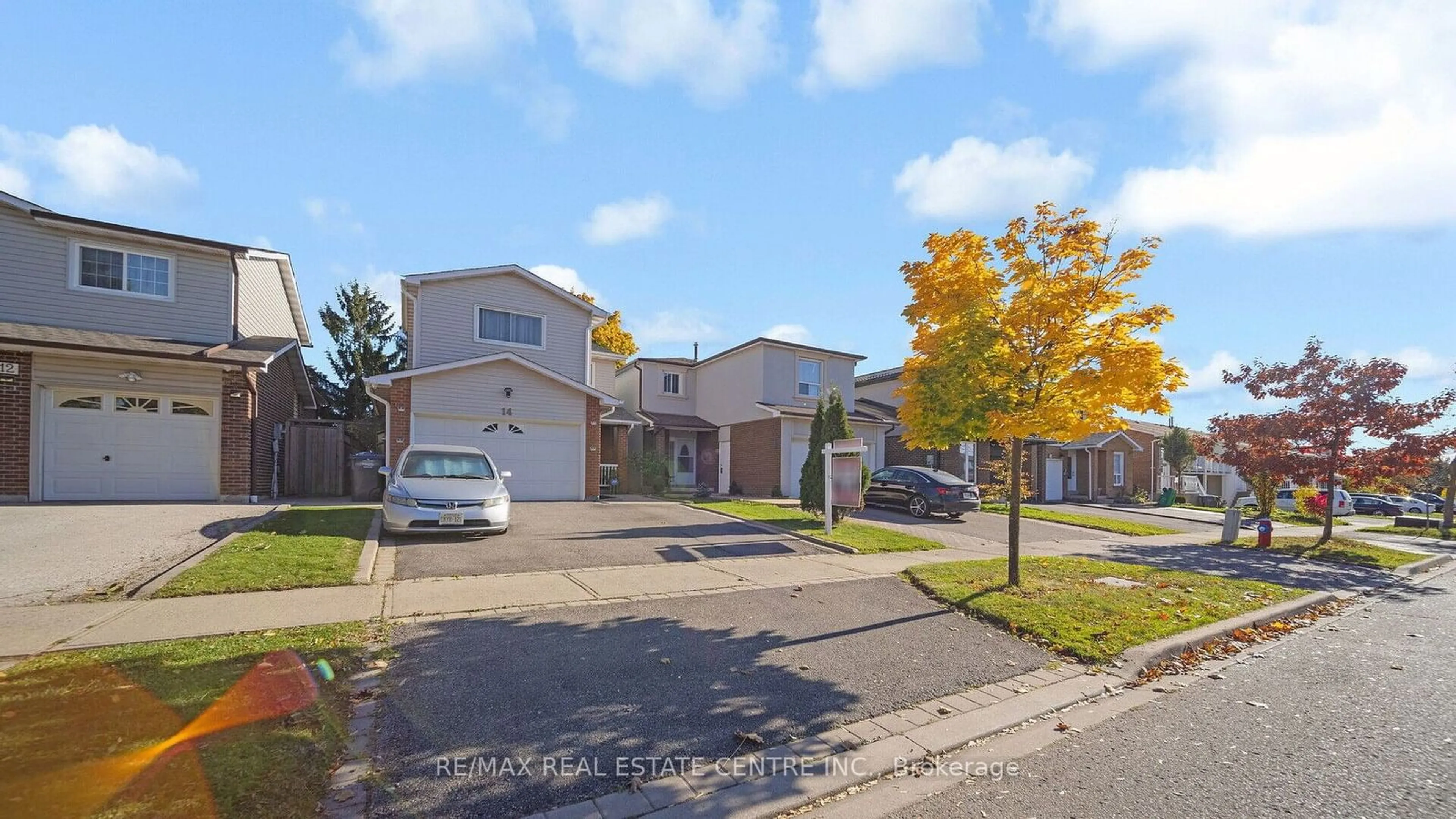 A pic from exterior of the house or condo, the street view for 14 Simmons Blvd, Brampton Ontario L6V 3V5