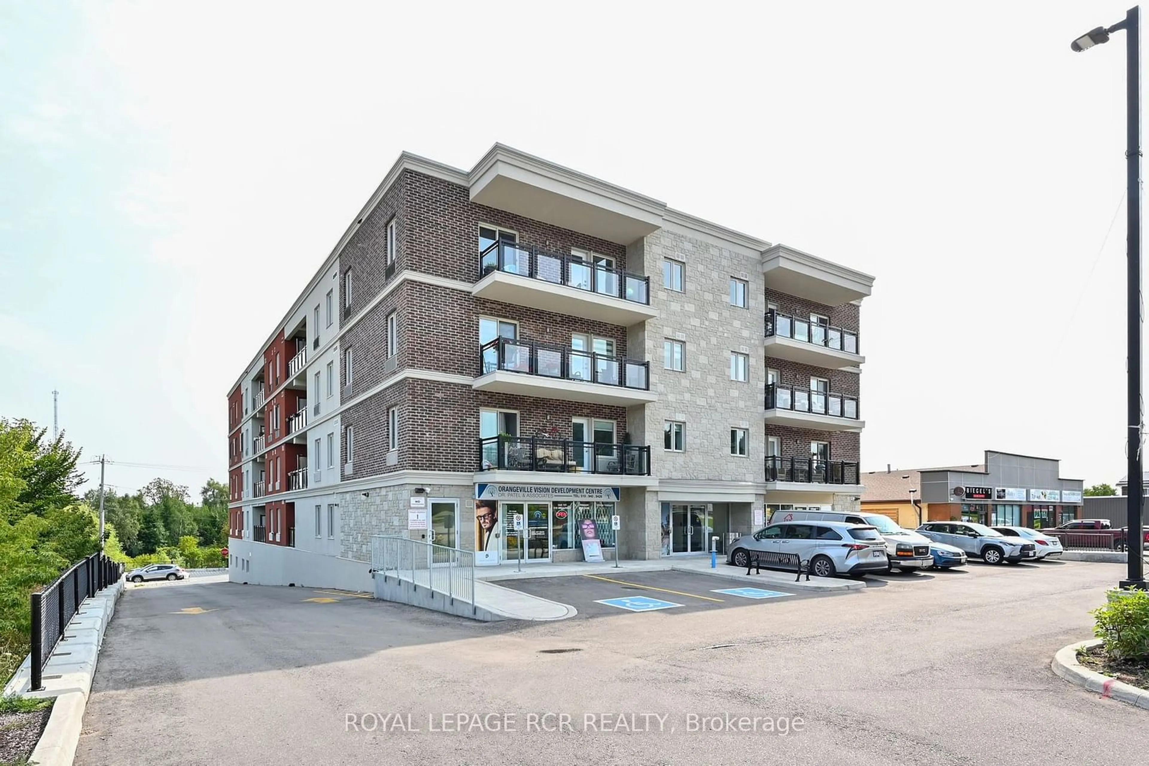 A pic from exterior of the house or condo, the front or back of building for 310 Broadway #107, Orangeville Ontario L9W 1L3