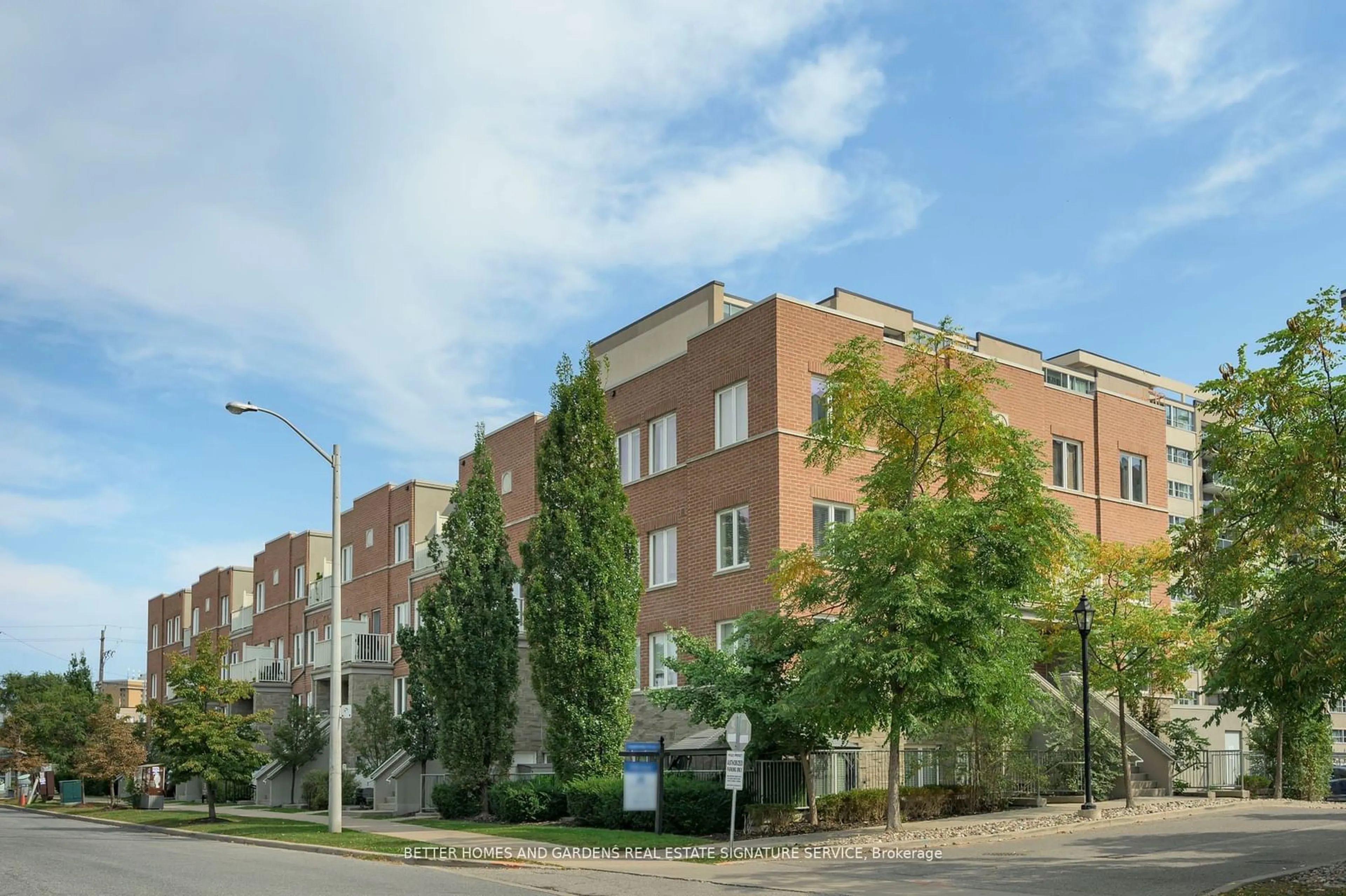 A pic from exterior of the house or condo, the front or back of building for 5 Richgrove Dr #210, Toronto Ontario M9R 0A3