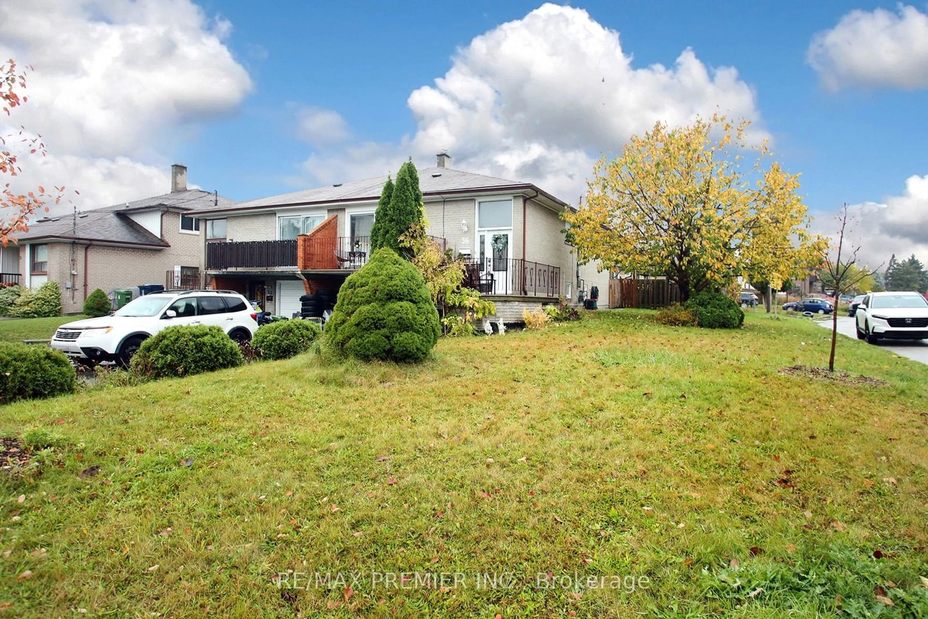 A pic from exterior of the house or condo, the fenced backyard for 36 Newlin Cres, Toronto Ontario M3L 1X6