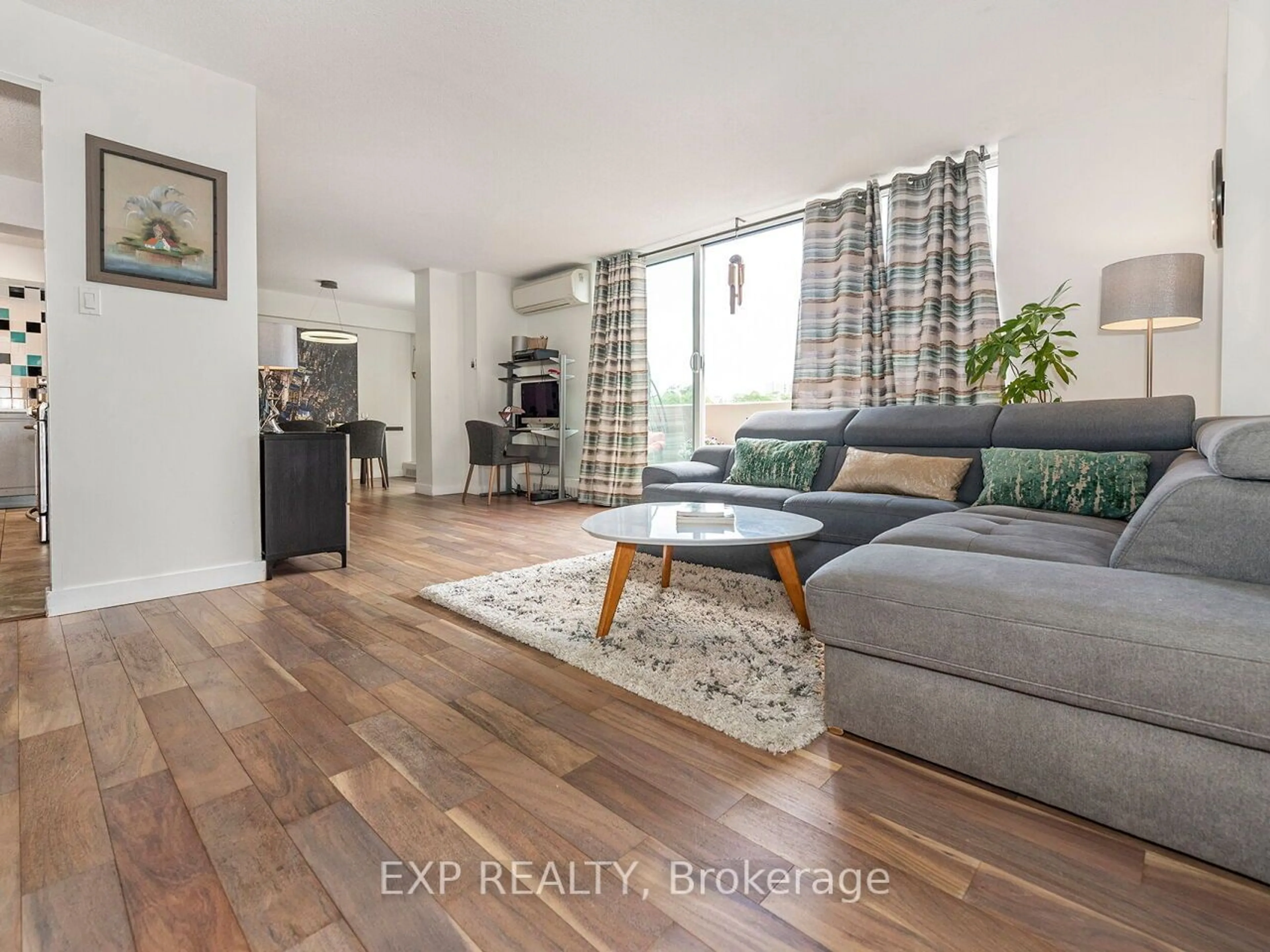 Living room, wood floors for 60 Southport St #314, Toronto Ontario M6S 3N4