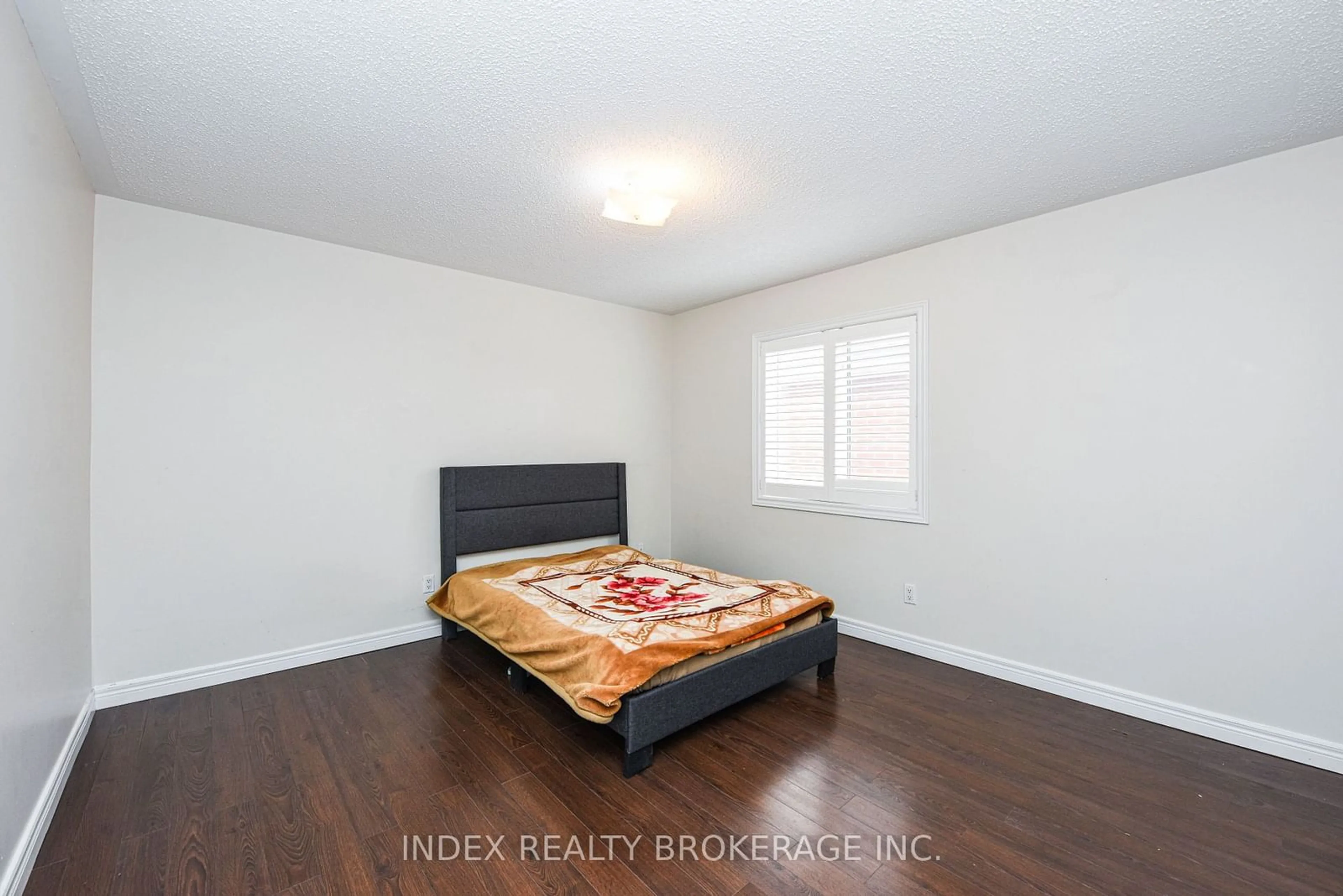 A pic of a room, wood floors for 32 Charger Lane, Brampton Ontario L7A 3C1