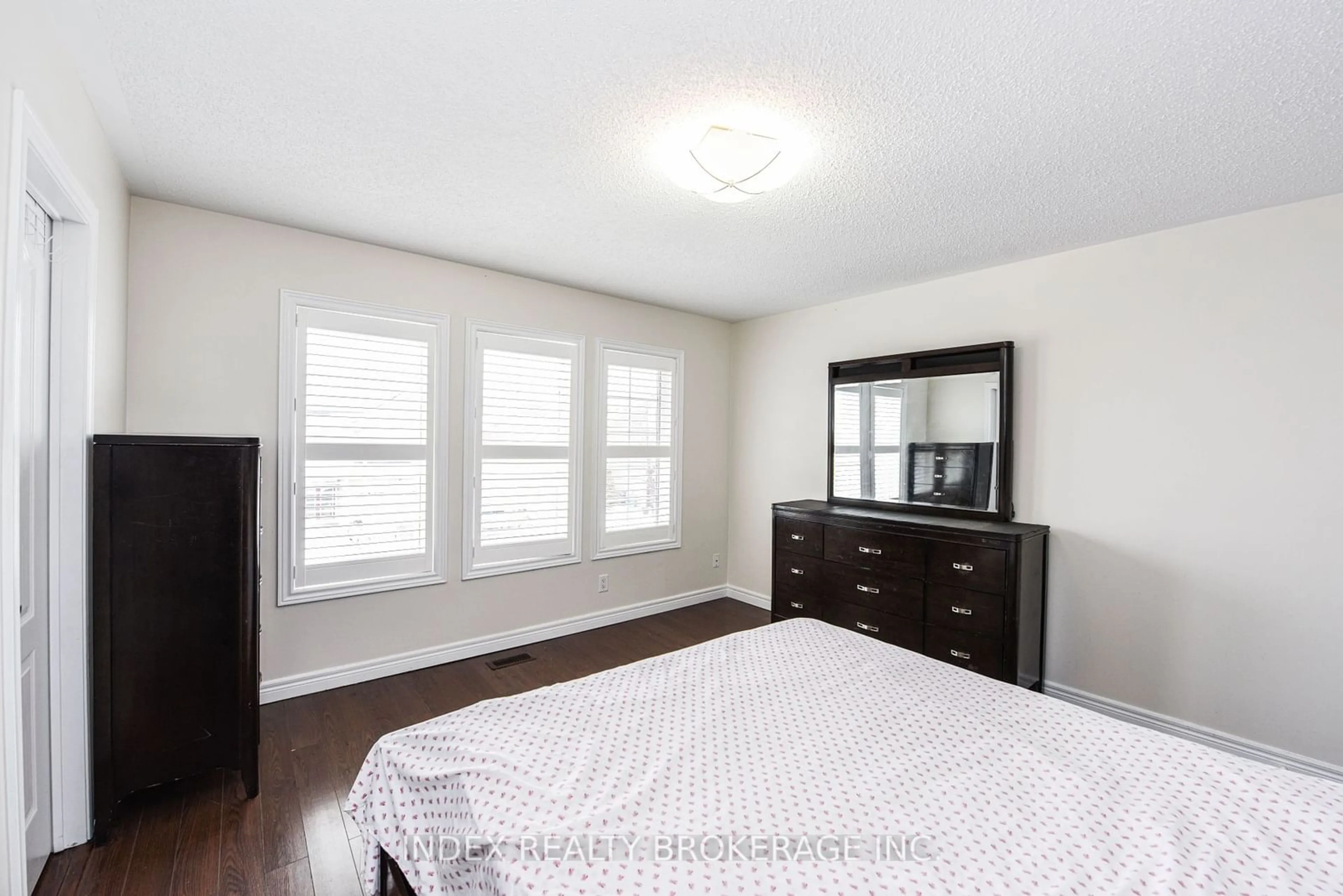 A pic of a room, wood floors for 32 Charger Lane, Brampton Ontario L7A 3C1