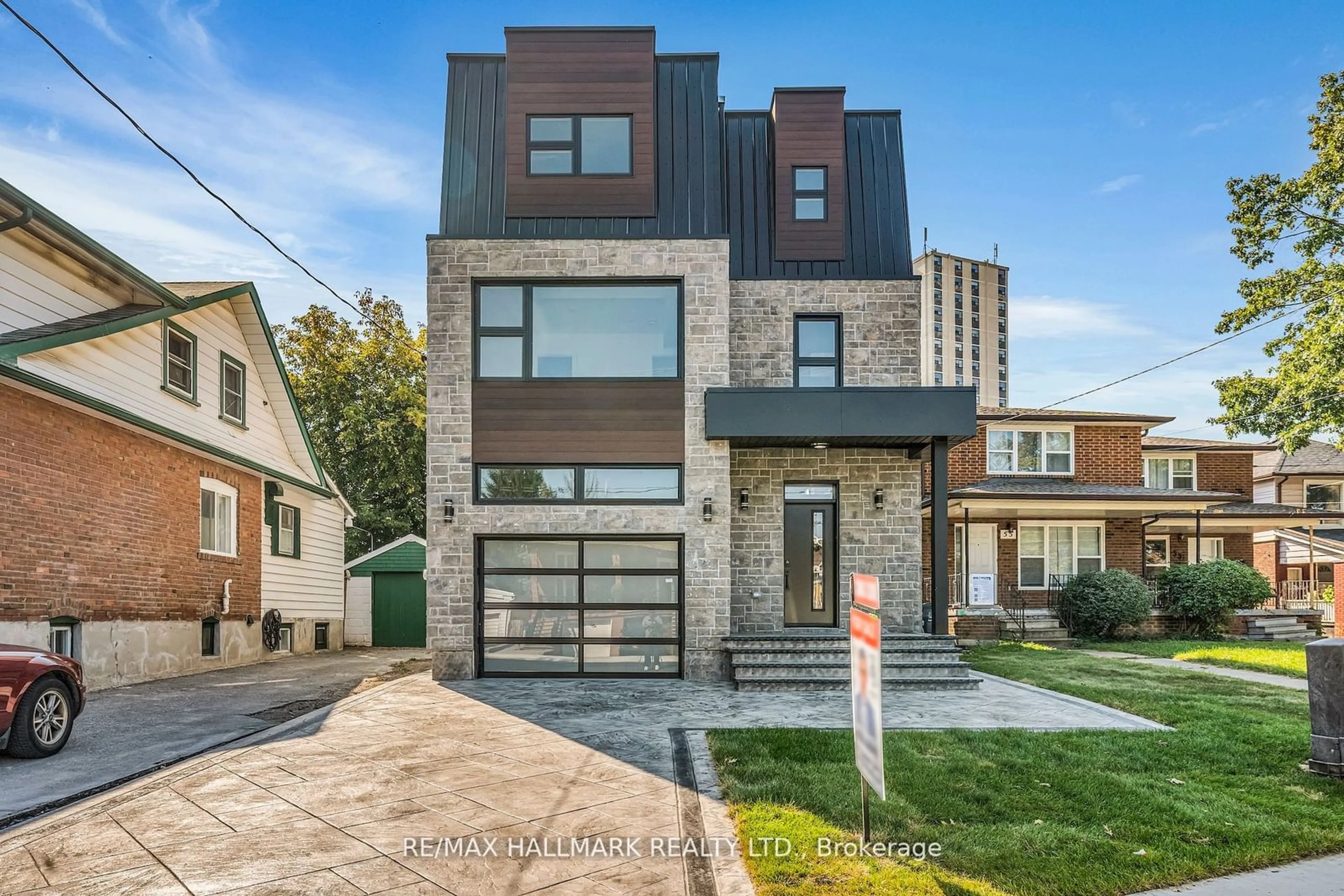 Home with brick exterior material for 53 Buttonwood Ave, Toronto Ontario M6M 2H9